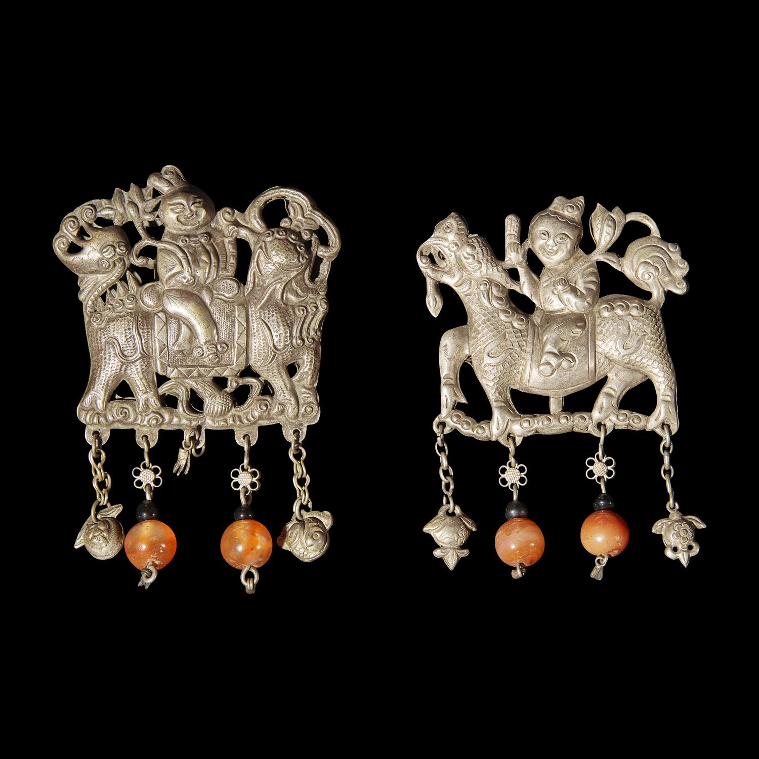 A Group of 10 Assorted Chinese Silver 'Boy and Qilin' Pendants, Late Qing Dynasty-Republic Period 晚清-民國 銀麒麟送子墜瑪瑙長命鎖及其他一組十件