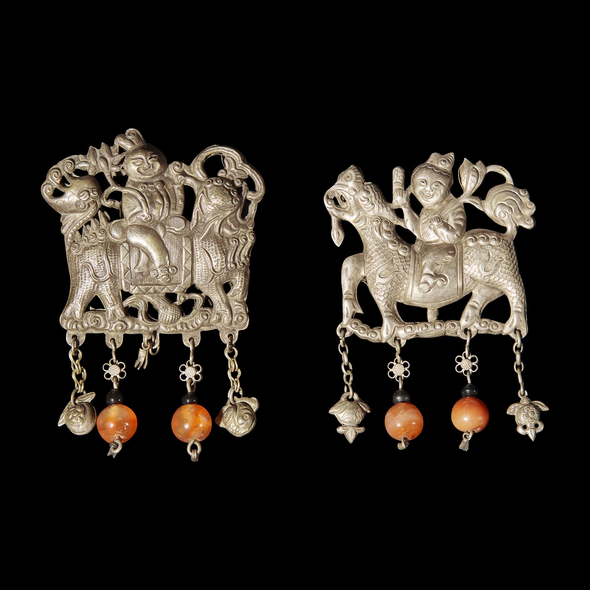 A Group of 10 Assorted Chinese Silver 'Boy and Qilin' Pendants, Late Qing Dynasty-Republic Period 晚清-民國 銀麒麟送子墜瑪瑙長命鎖及其他一組十件