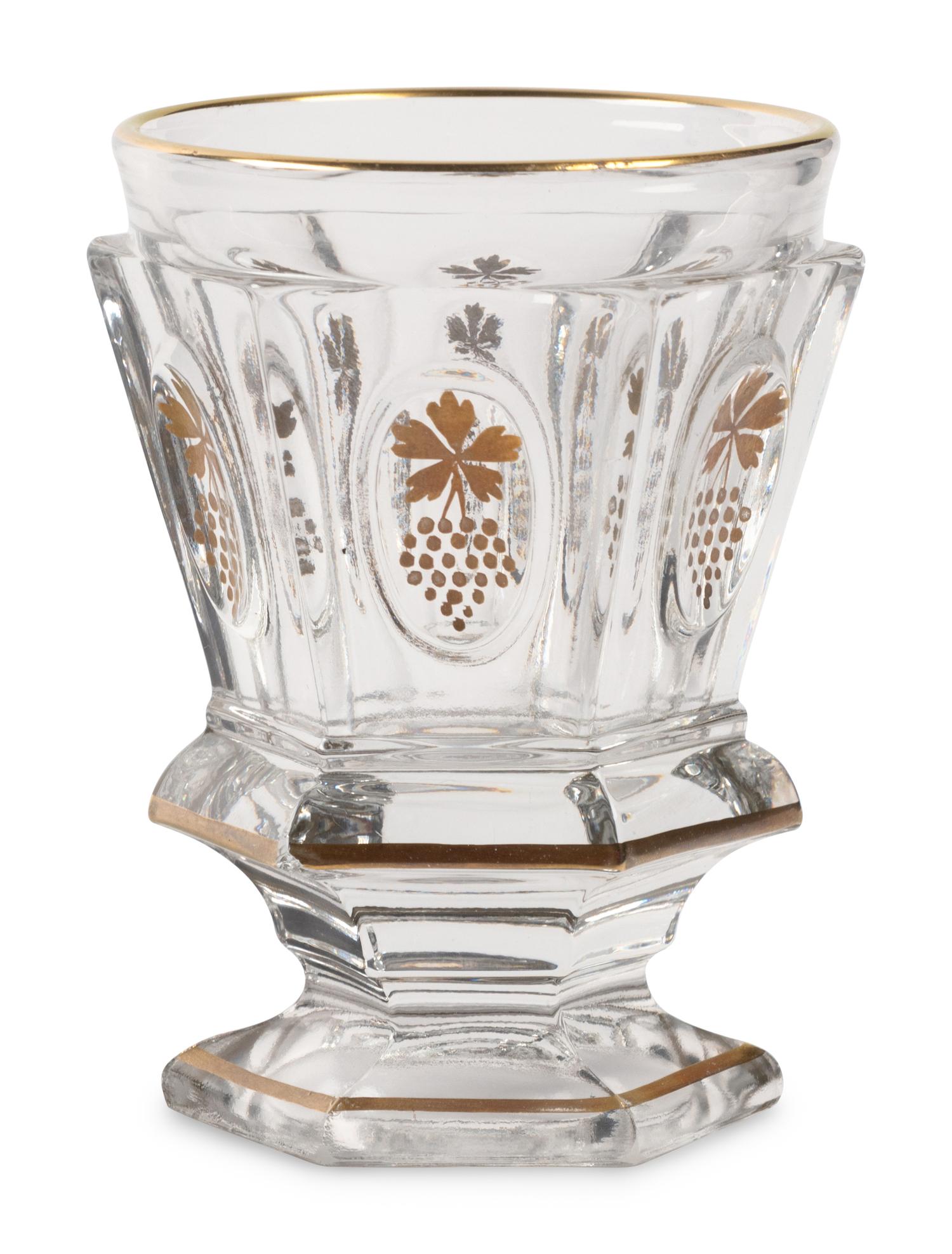 A Val Saint Lambert Gilt Decorated Cut Glass Table Service