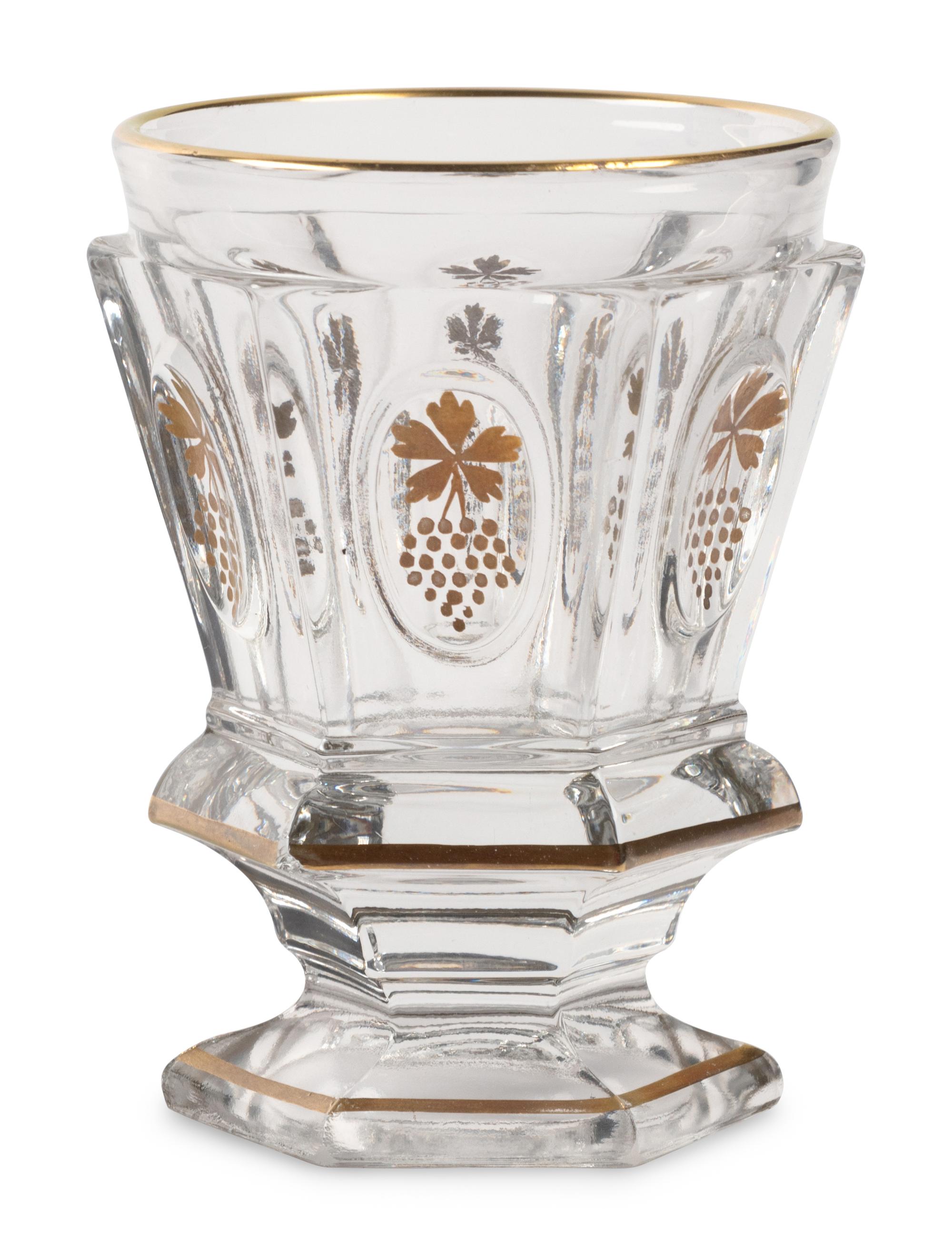 A Val Saint Lambert Gilt Decorated Cut Glass Table Service