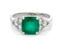 An 18 Karat White Gold, Emerald and Diamond Ring,