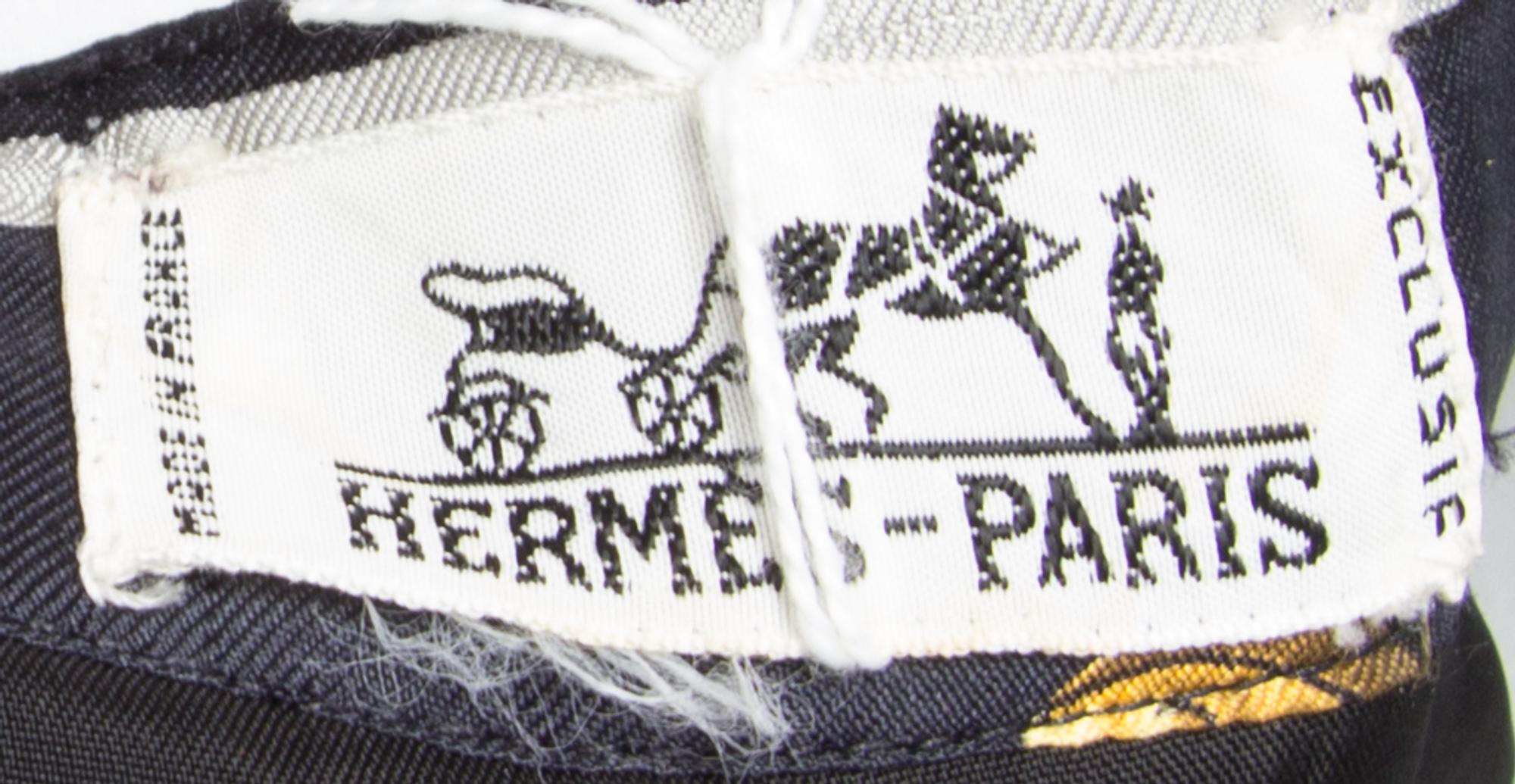 An Hermes Reversible Black Jacket Ensemble,