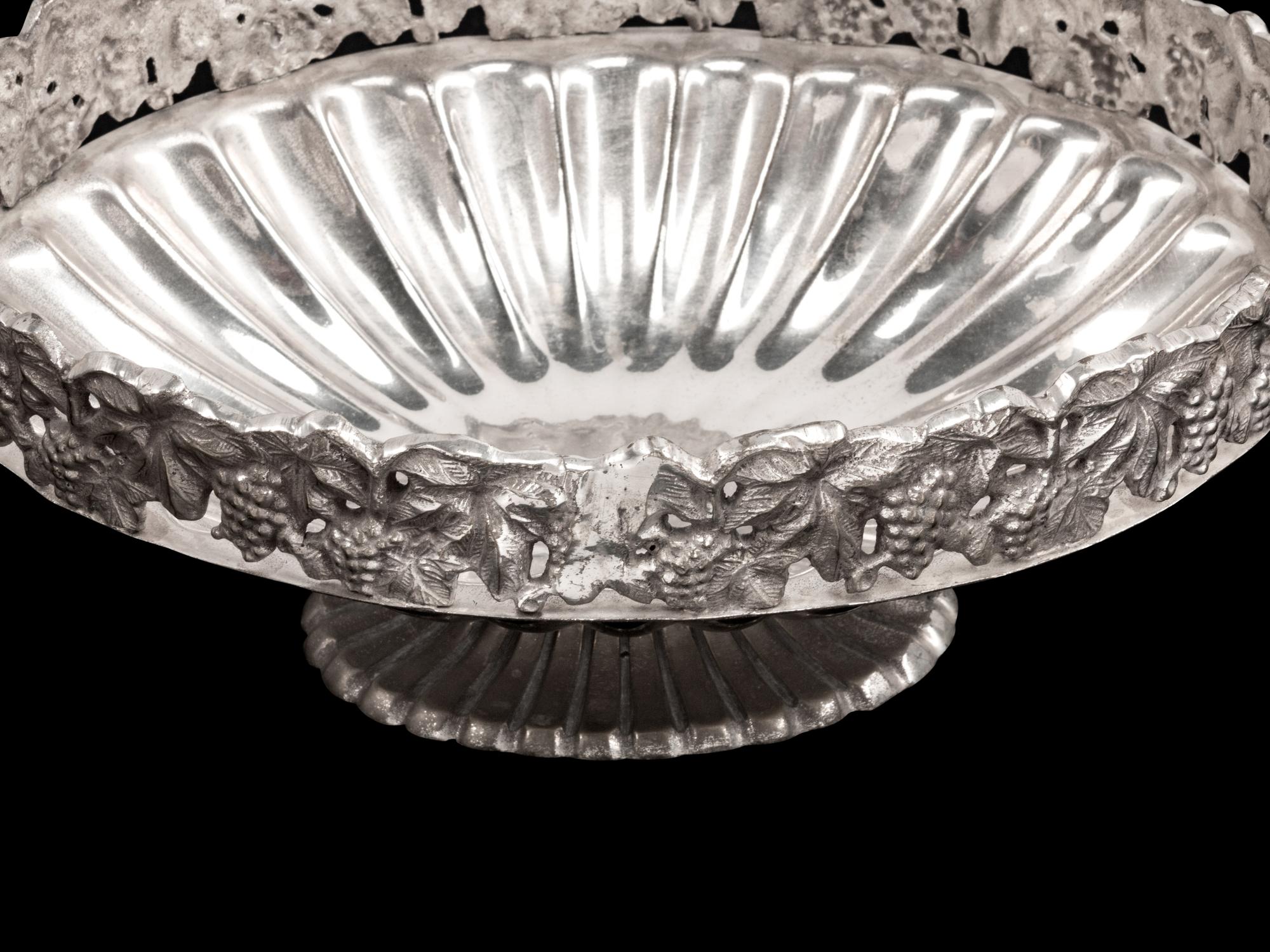 A Set of Four Silverplated Two-Handled Oval Bowls
