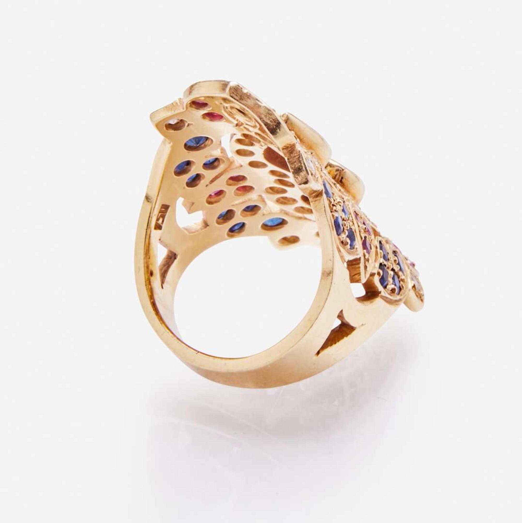 An 18K Yellow Gold and Gemstone Ring