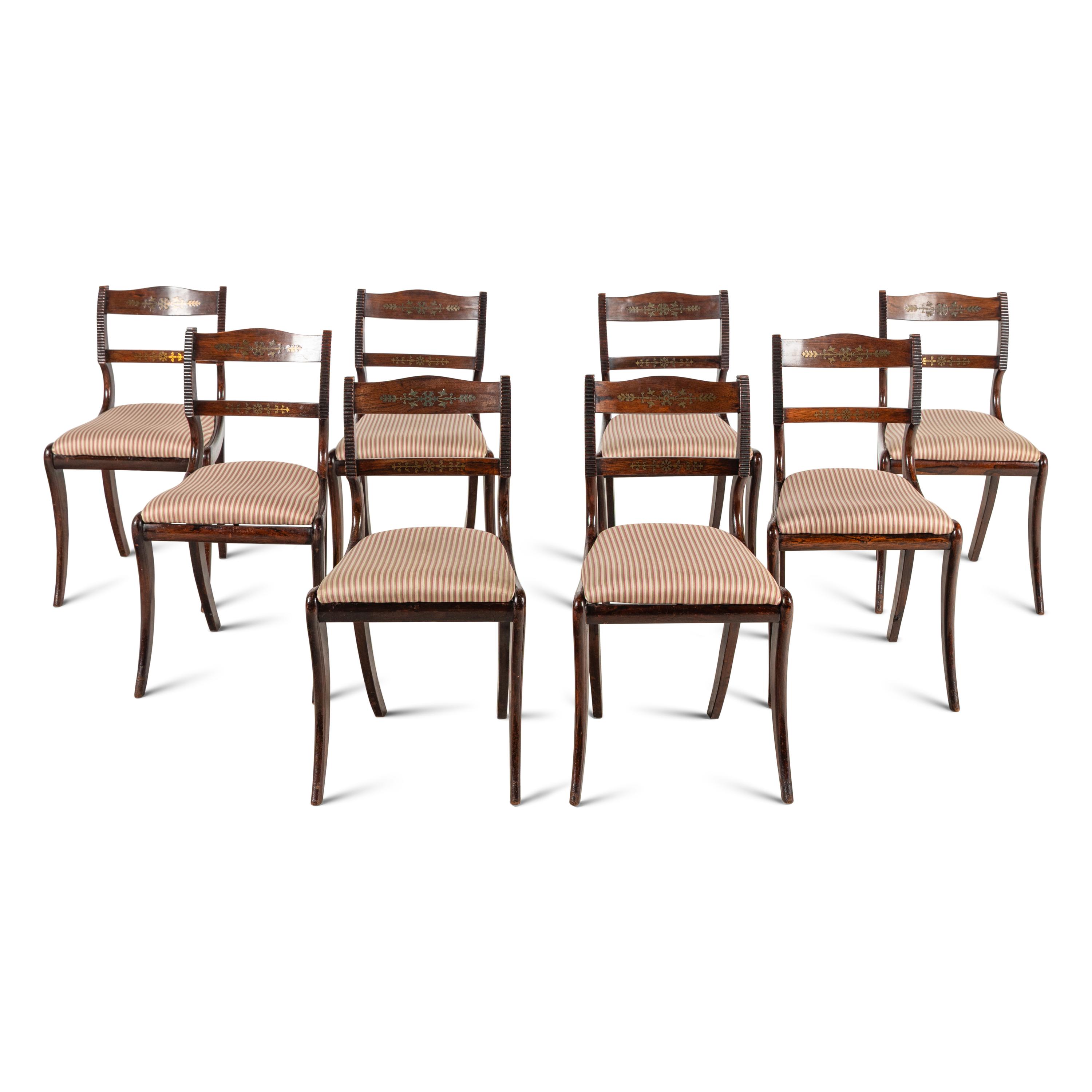 A Set of Eight Regency Brass Inlaid Mahogany Dining Chairs