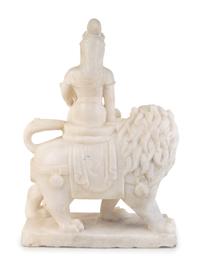 A Chinese Marble Figure of Guanyin Seated on a Fu Lion