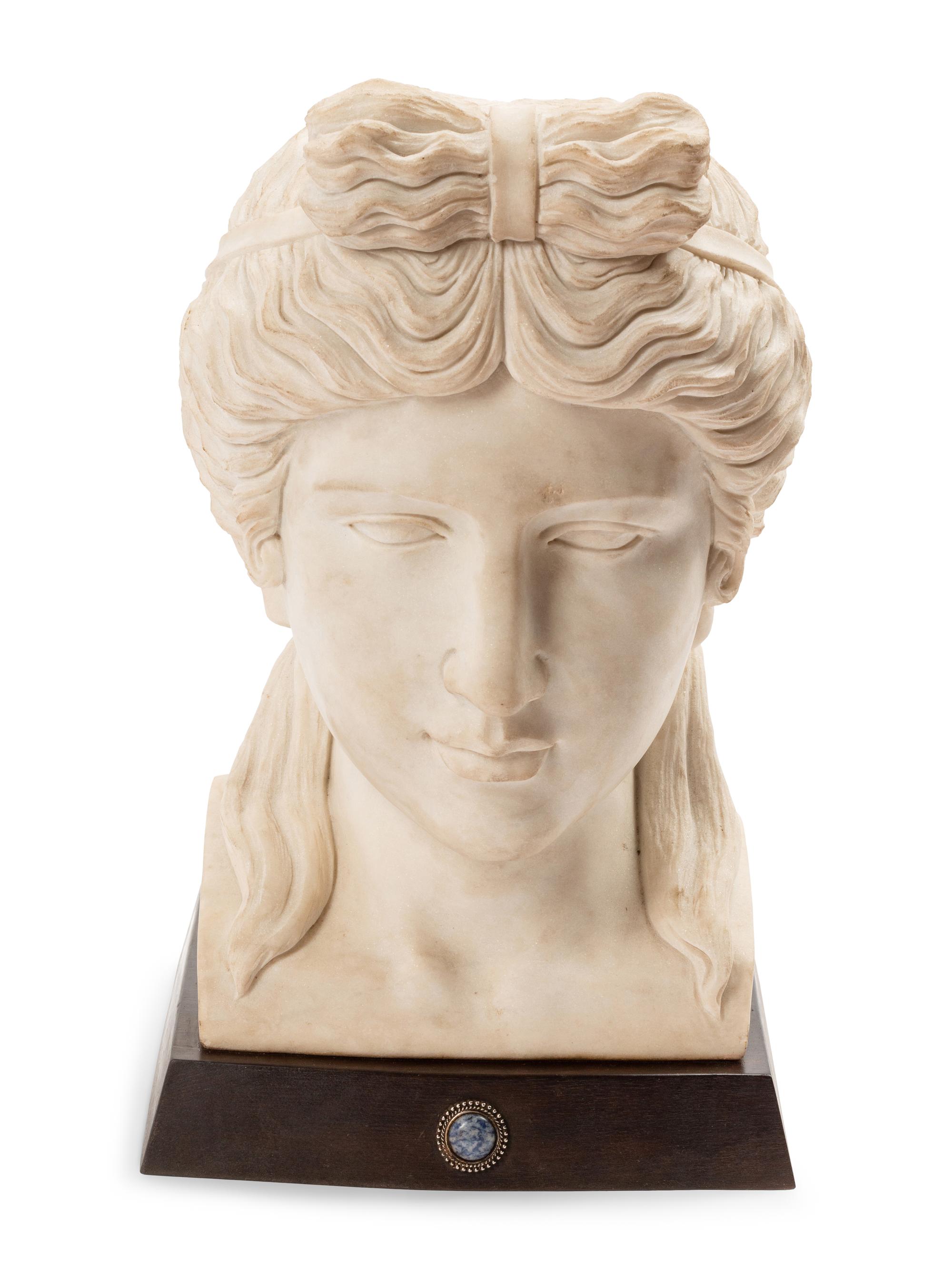 A Composition Marble Head After the Antique