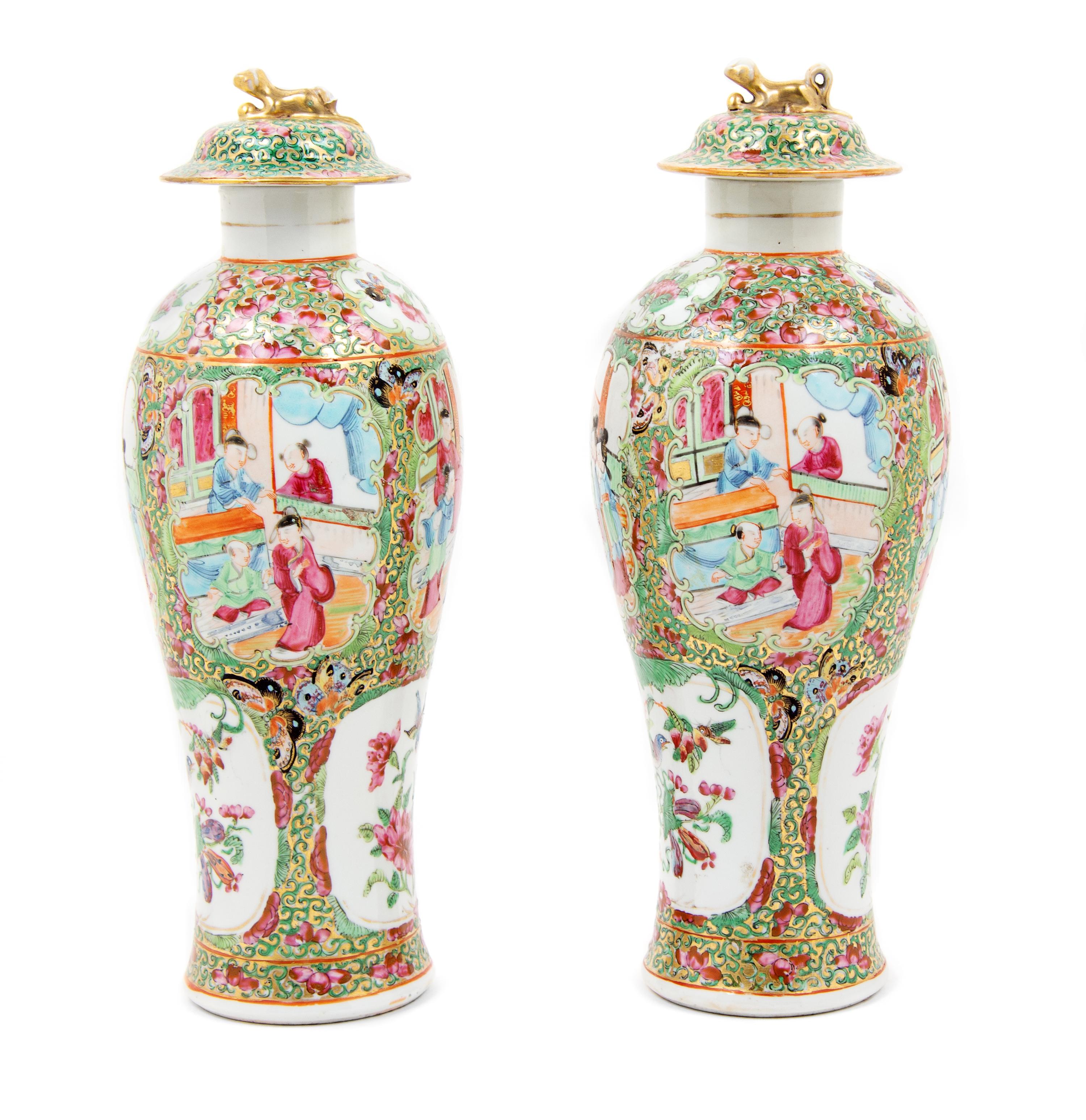 A Pair of Chinese Export Rose Medallion Porcelain Covered Vases Height of each 12 1/4 inches. — 19TH CENTURY