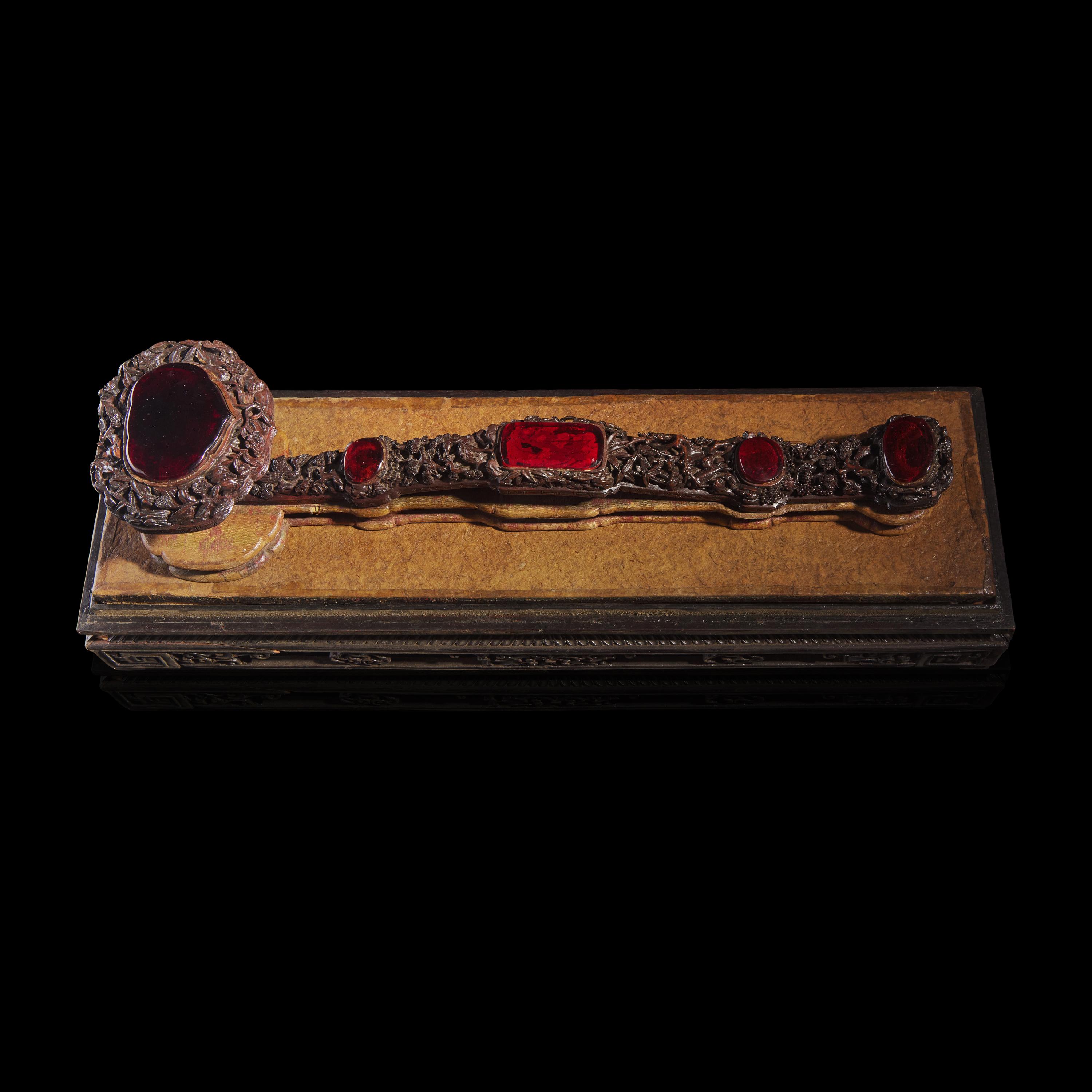 A Chinese Amber Glass-Inset Carved Wood Ruyi Scepter and Stand, with Three Photo Albums, Late 19th-Early 20th Century — 清晚期 紅木雕花三鑲琥珀料如意及相冊三簿