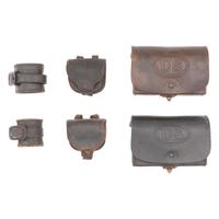 Group of Civil War Era Accoutrements: 2 Mann's Patent Cartridge Boxes, 2 Cap Pouches and 2 Carbine Socekts