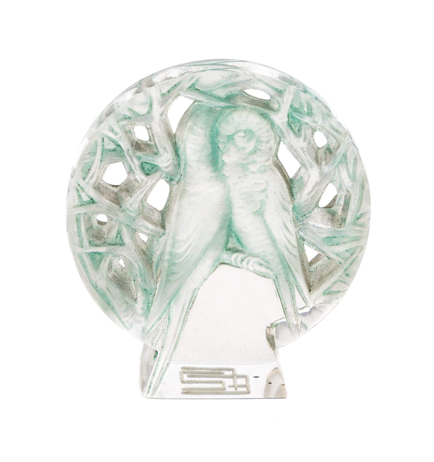 A Rene Lalique Molded and Frosted Glass Seal Height 2 inches.