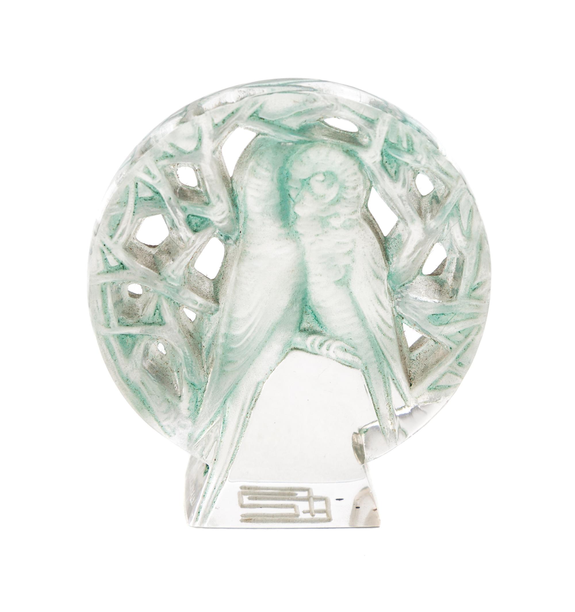 A Rene Lalique Molded and Frosted Glass Seal Height 2 inches.