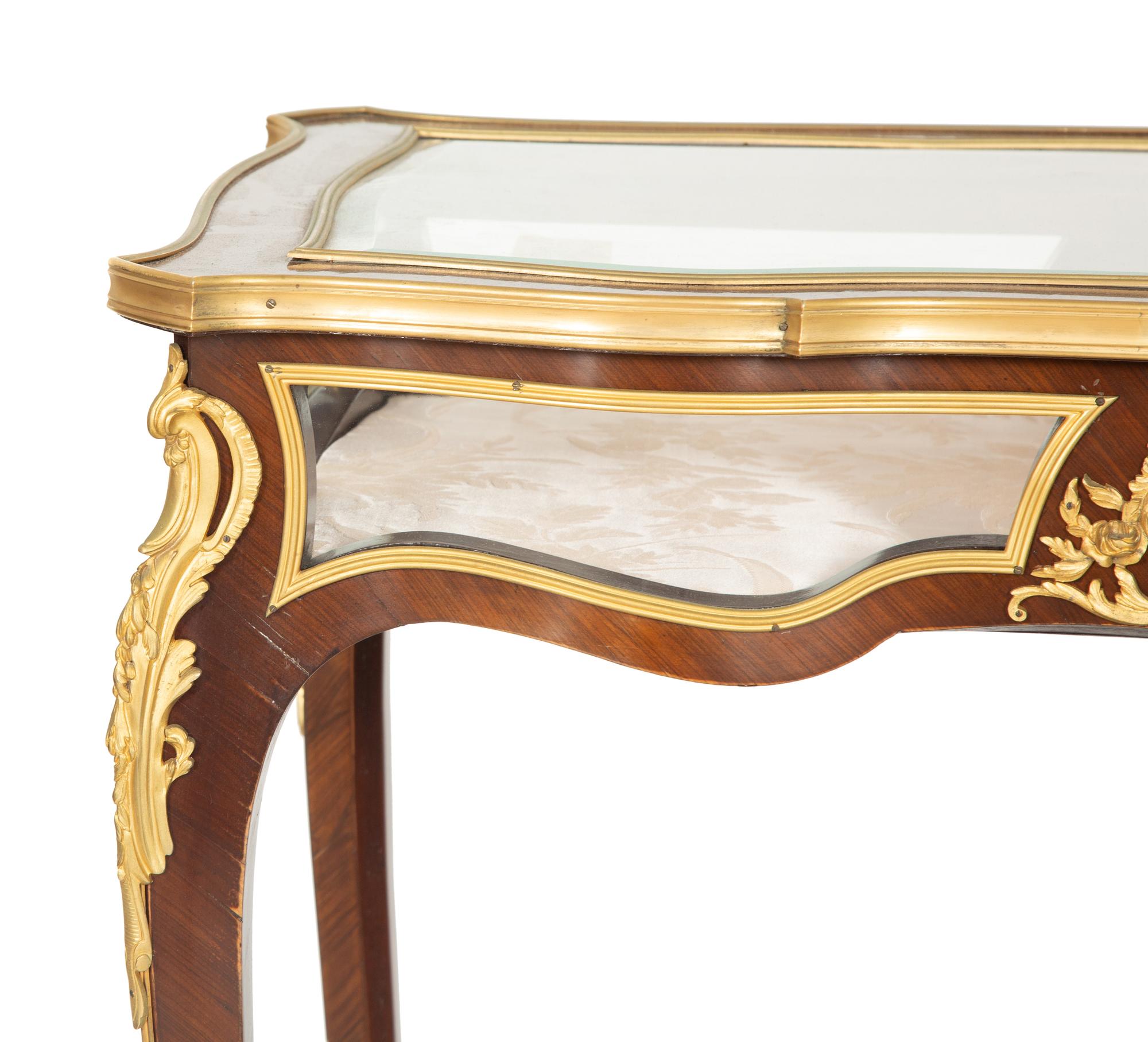 A Louis XV Style Gilt Bronze Mounted Mahogany Vitrine Table