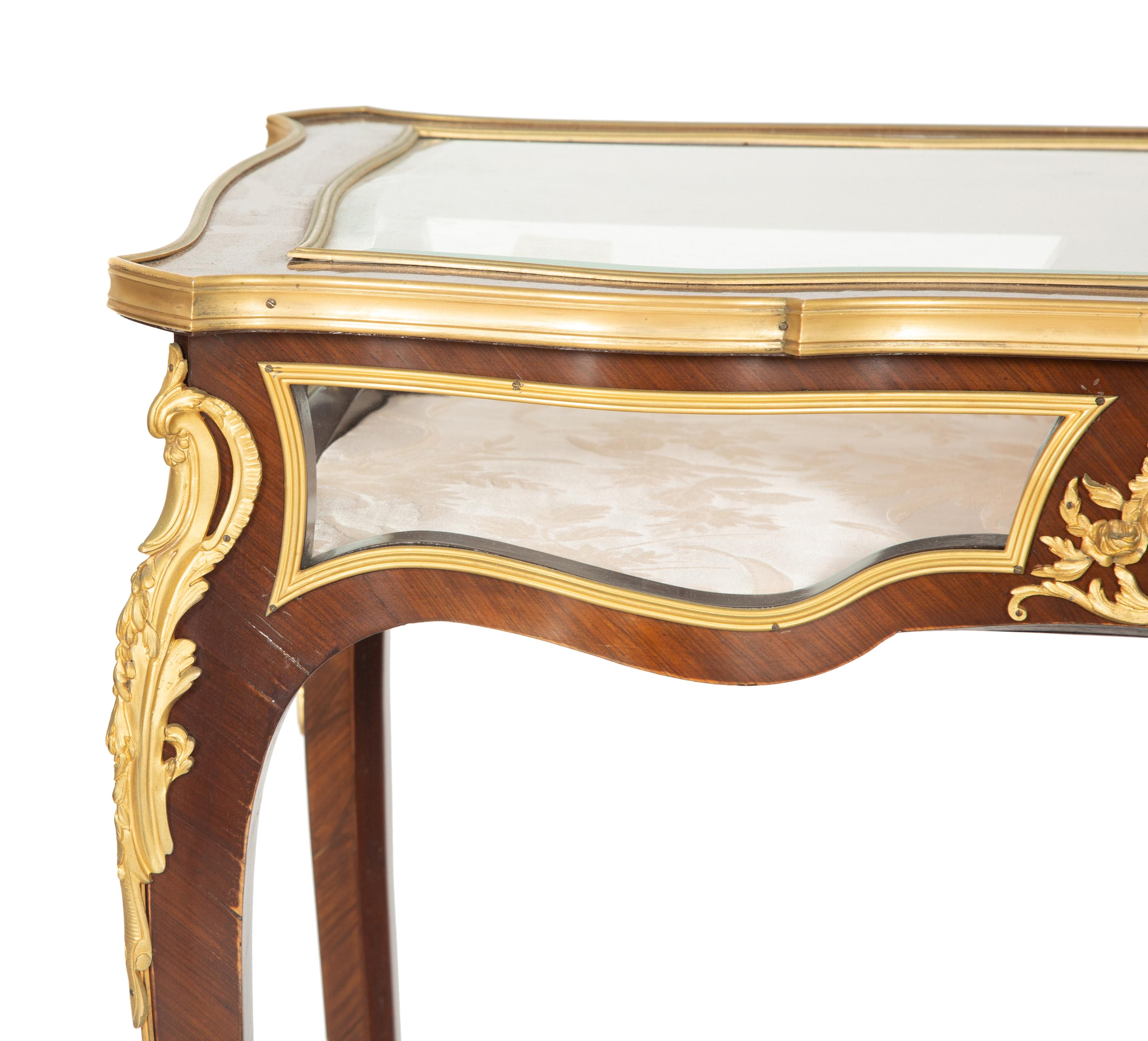 A Louis XV Style Gilt Bronze Mounted Mahogany Vitrine Table