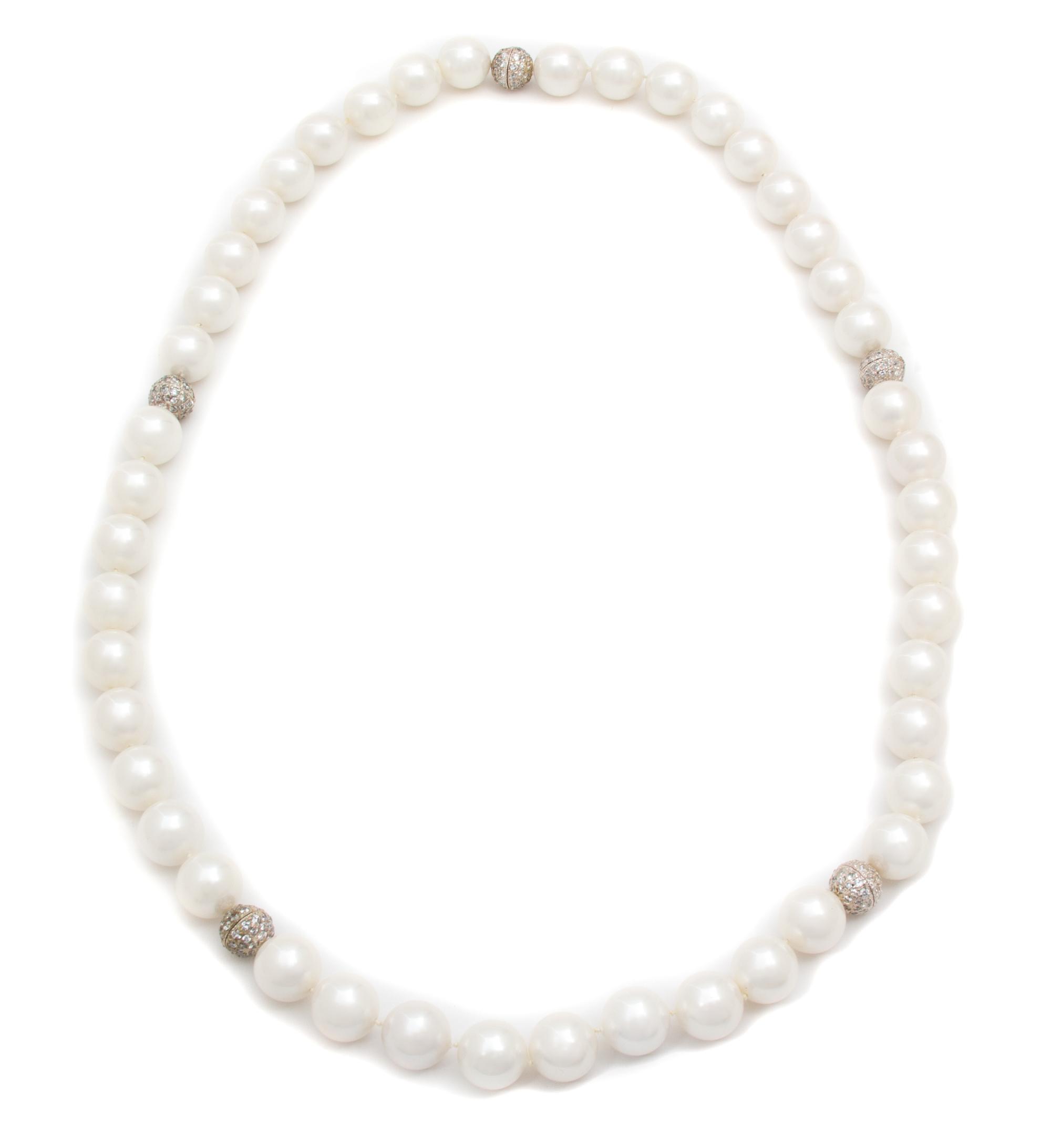 A Pair of Faux South Sea Pearl Necklaces, 18".