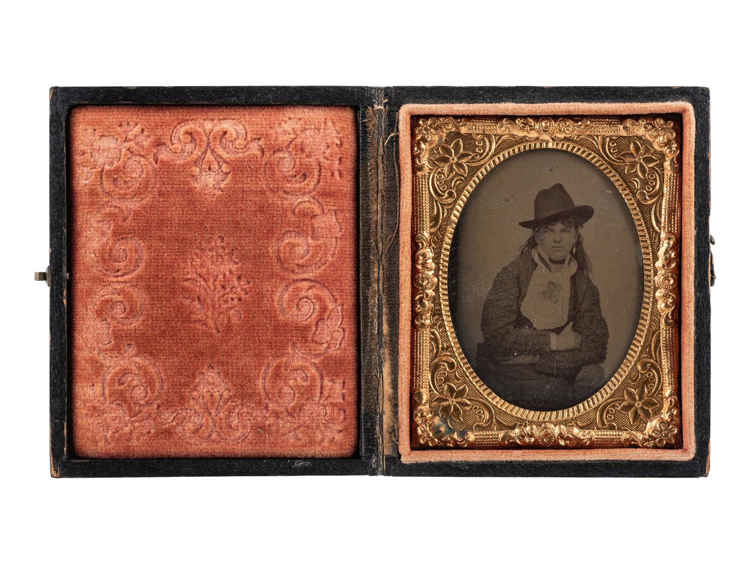[WESTERN AMERICANA]. Ninth plate tintype of cowgirl “Annie." Ca 1870.