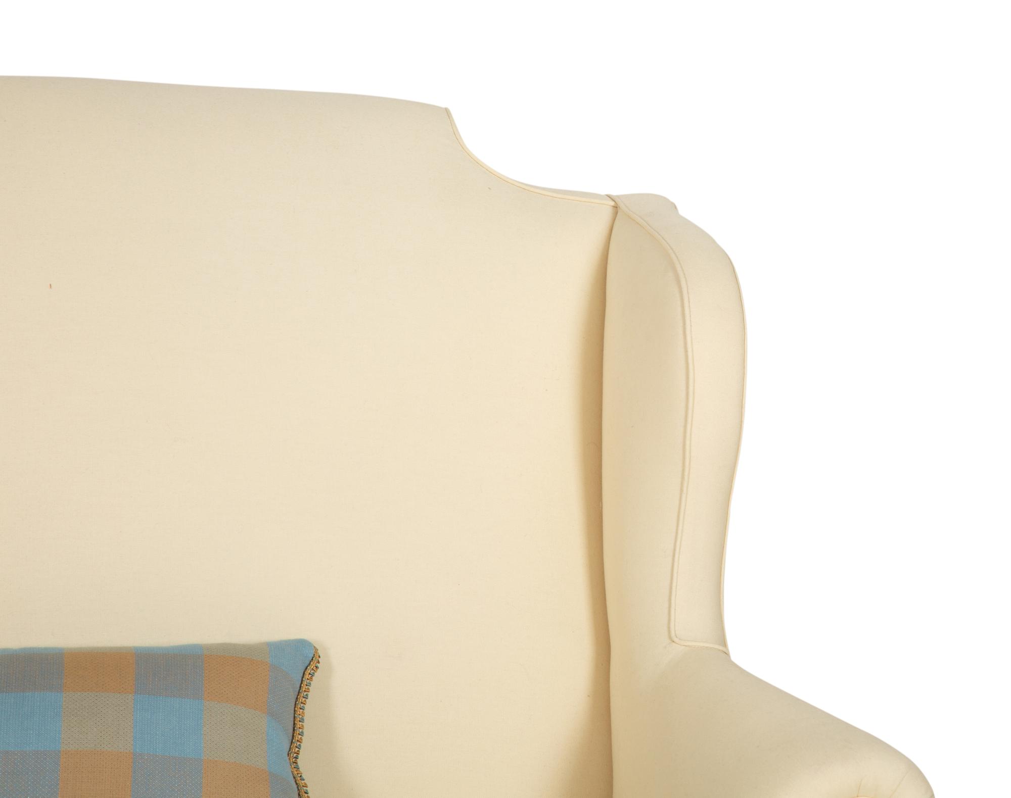A William & Mary Style Carved Oak Upholstered Wing Back Settee