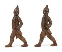 A Pair of Iron Andirons with Hessian Soldiers