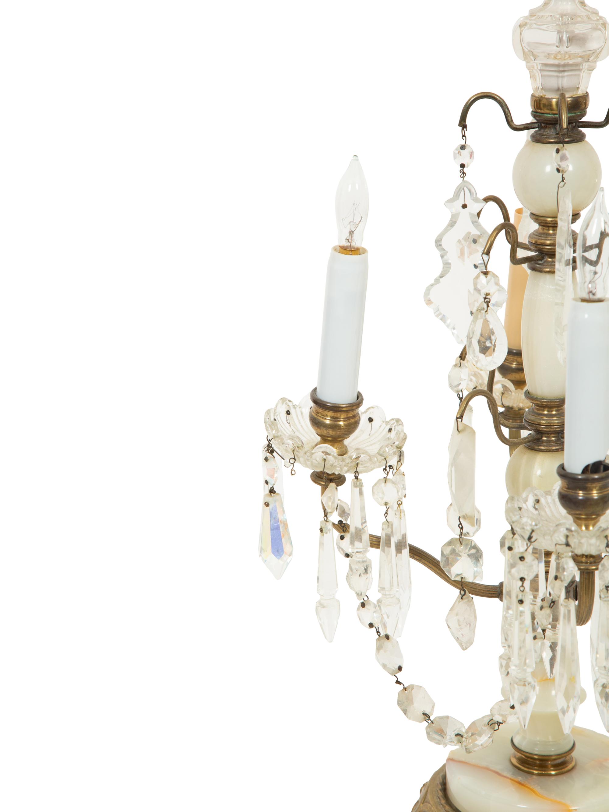 A Pair of Gilt Metal, Onyx, and Cut Glass Four Light Girandoles