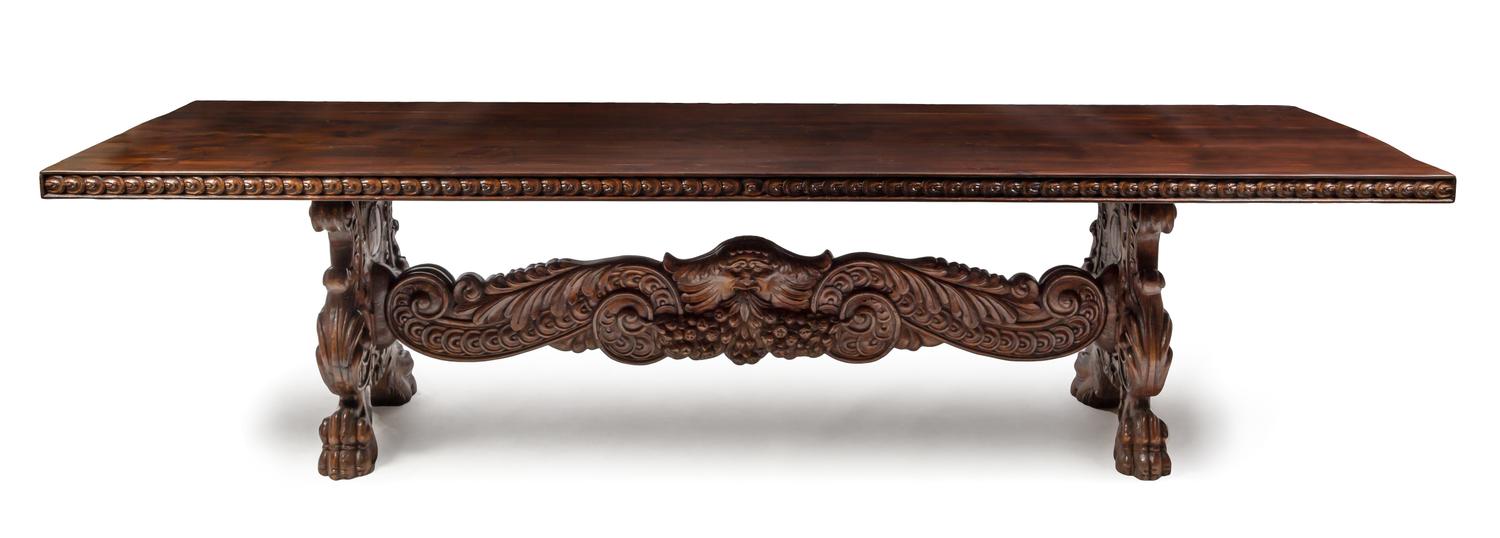 An Italian Renaissance Style Walnut Trestle Table Height 29 x width 38 1/2 x length 116 1/2 inches. — 20TH CENTURY