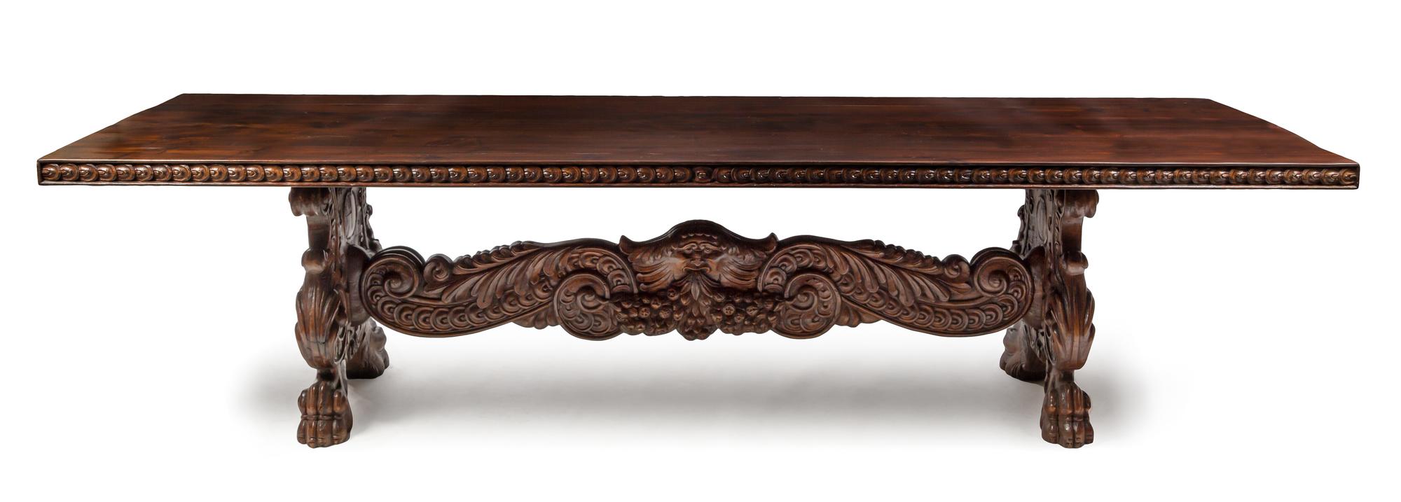 An Italian Renaissance Style Walnut Trestle Table Height 29 x width 38 1/2 x length 116 1/2 inches. — 20TH CENTURY