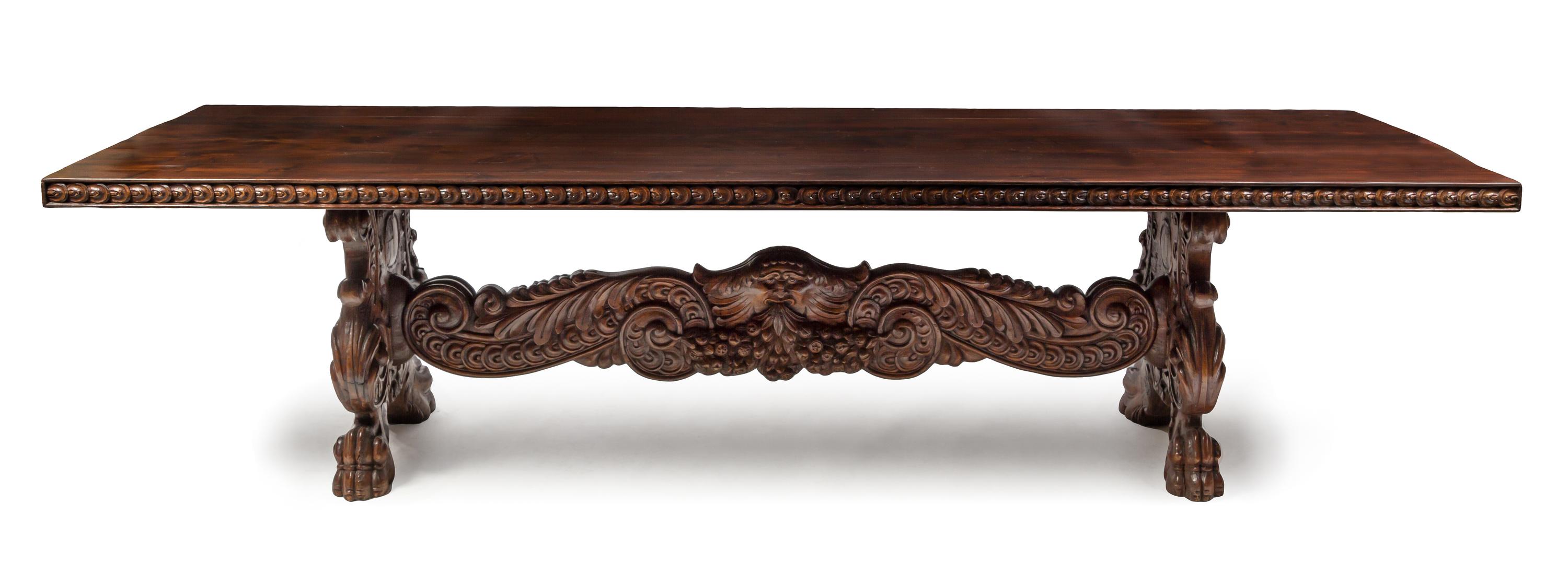 An Italian Renaissance Style Walnut Trestle Table Height 29 x width 38 1/2 x length 116 1/2 inches. — 20TH CENTURY