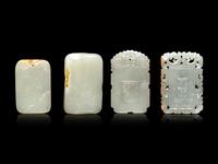 Four White and Russet Jade Plaques