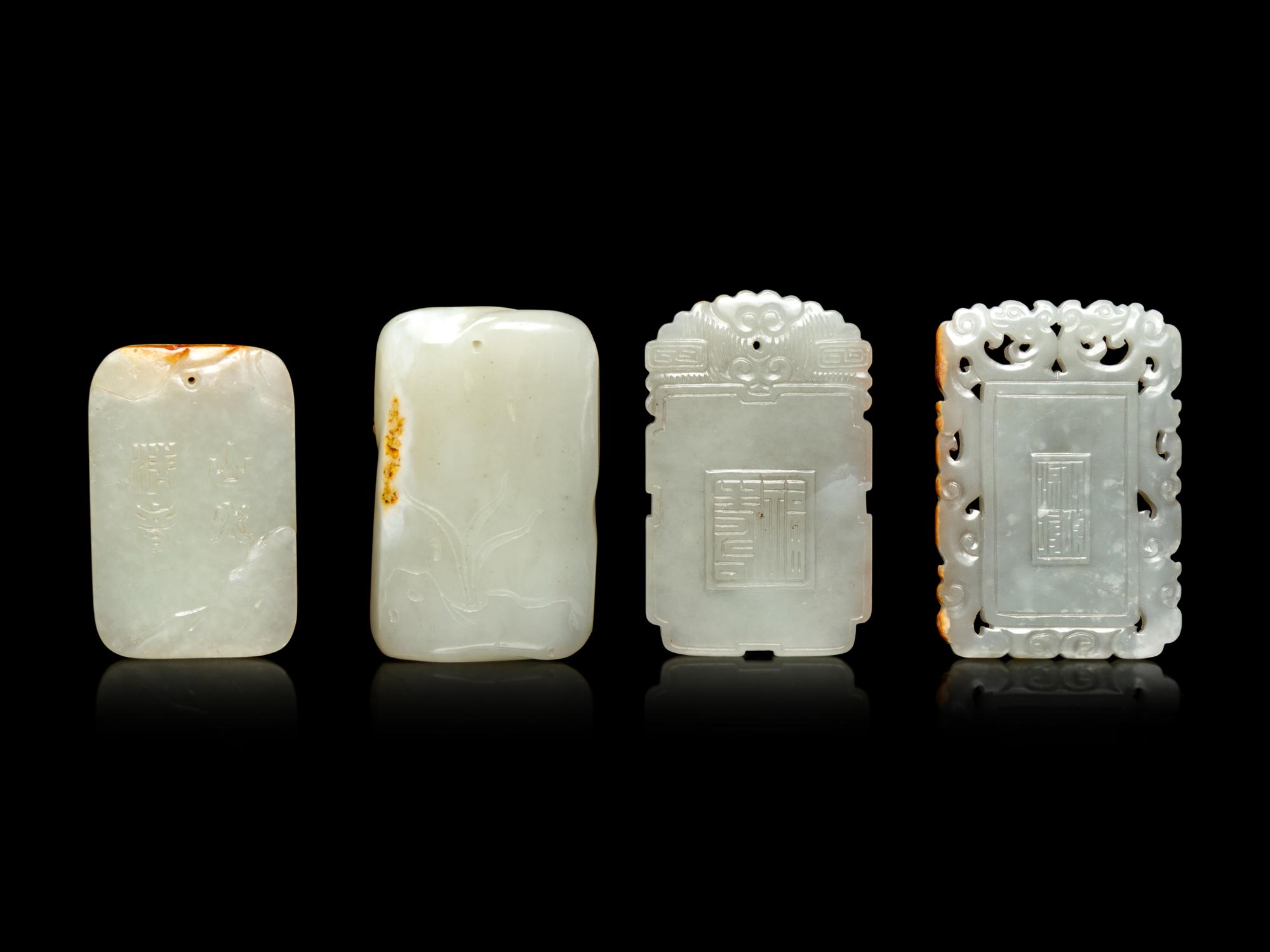 Four White and Russet Jade Plaques