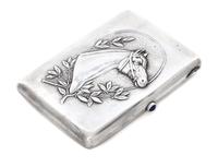 A Russian Silver Cigarette Case, Maker's mark Cyrillic DS, Moscow, the case worked to show the profile of a throughbred horse bordered