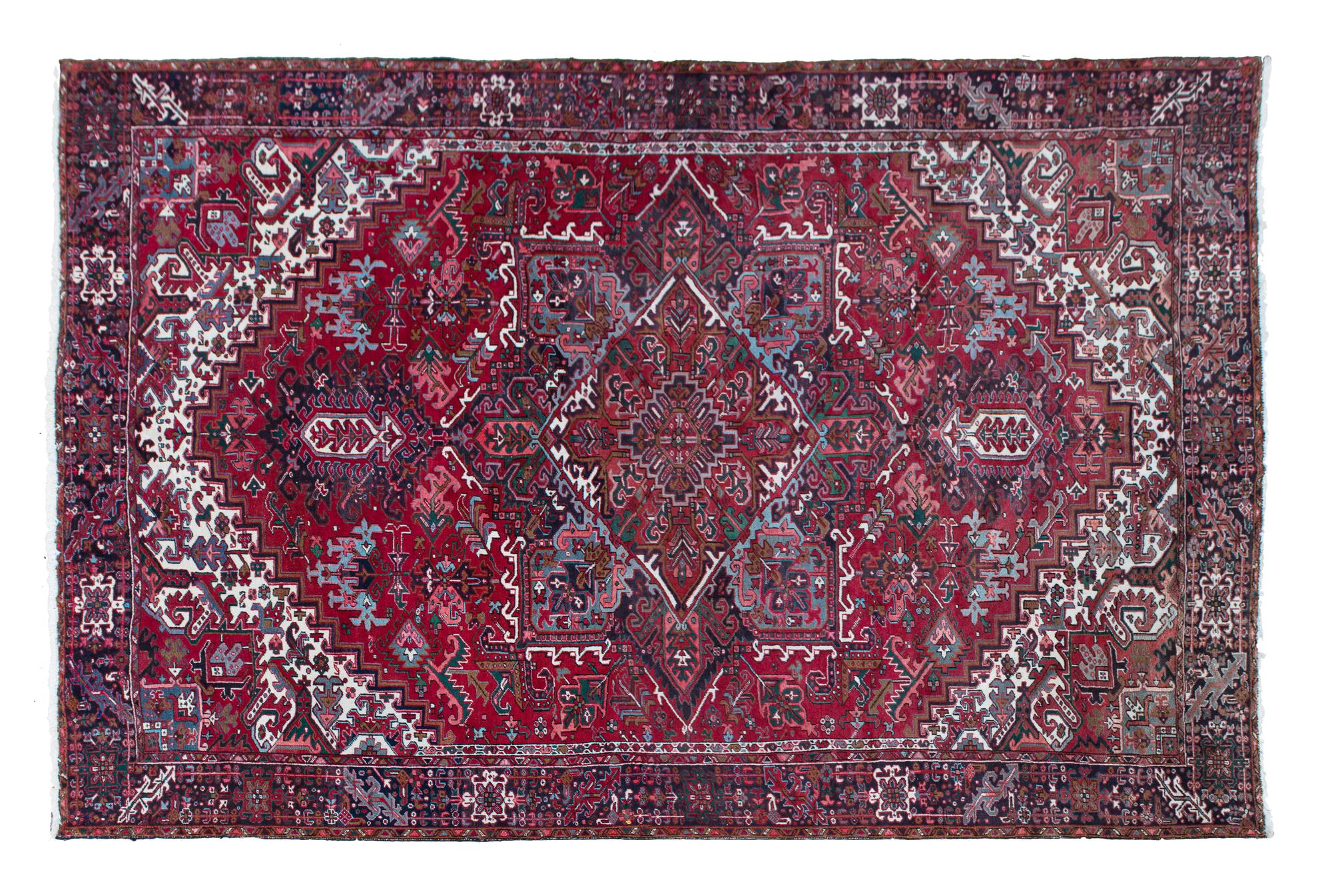 A Heriz Wool Rug 13 feet 11 inches x 11 feet 2 1/2 inches.