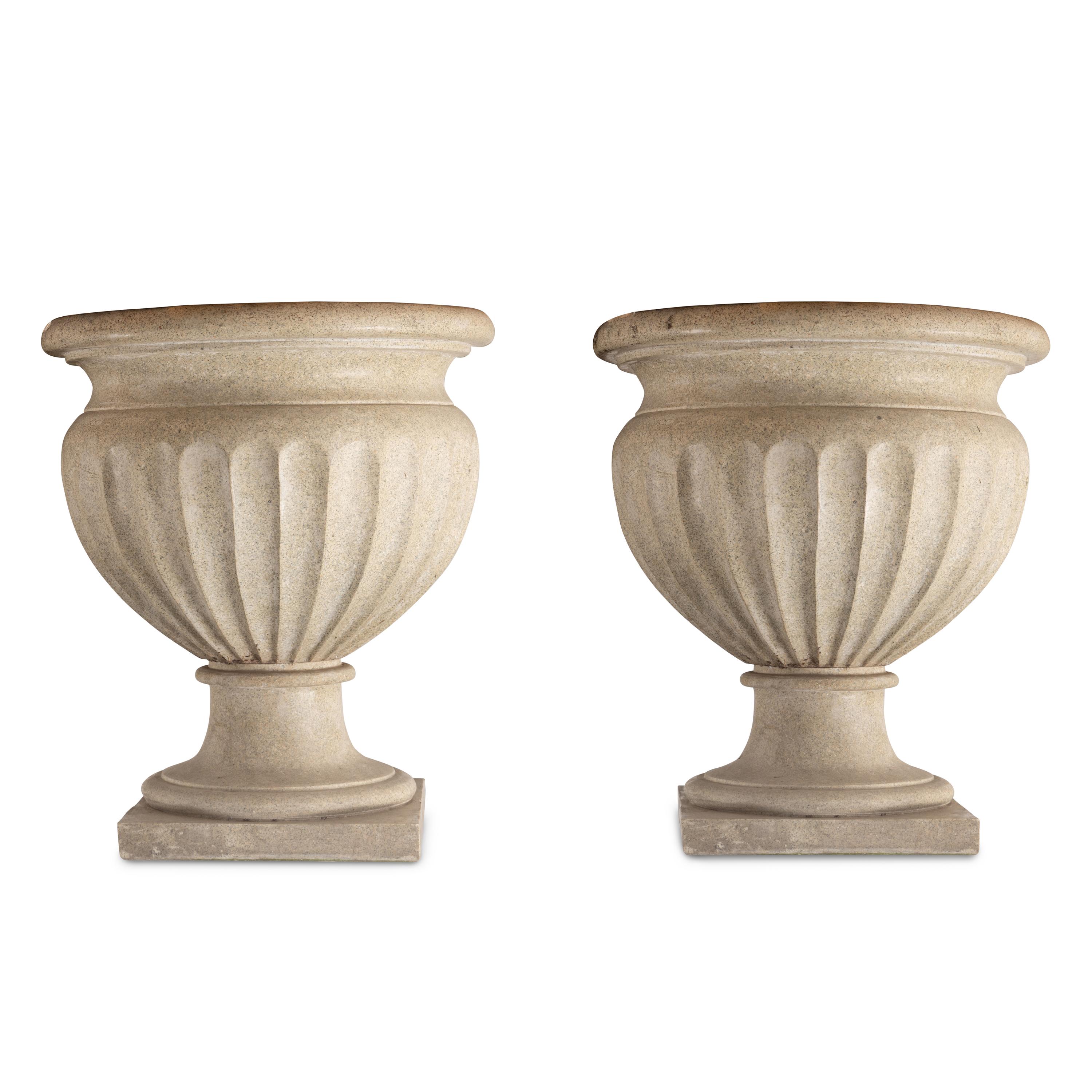 A Pair of Granite Garden Urns