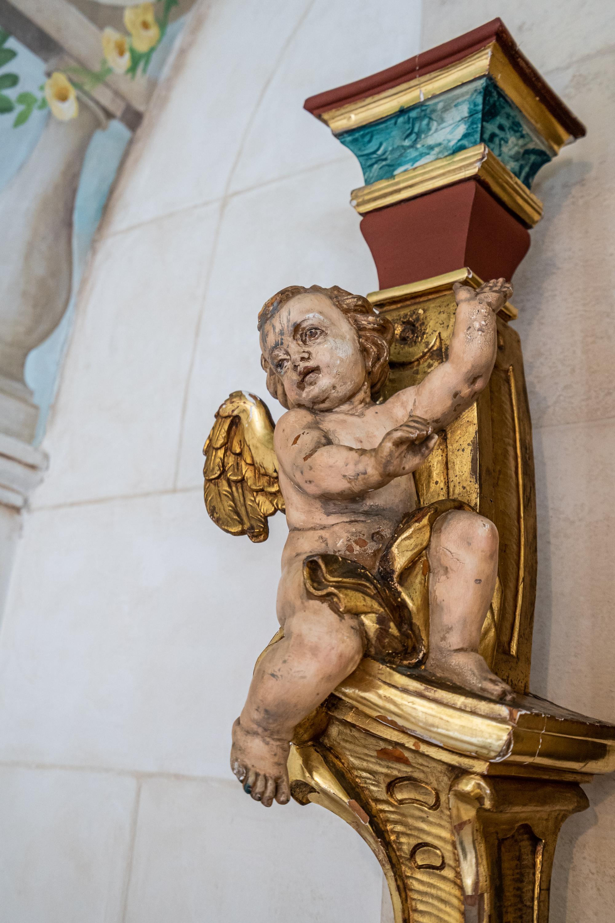 A Pair of Venetian Painted and Parcel Gilt Columns with Putti