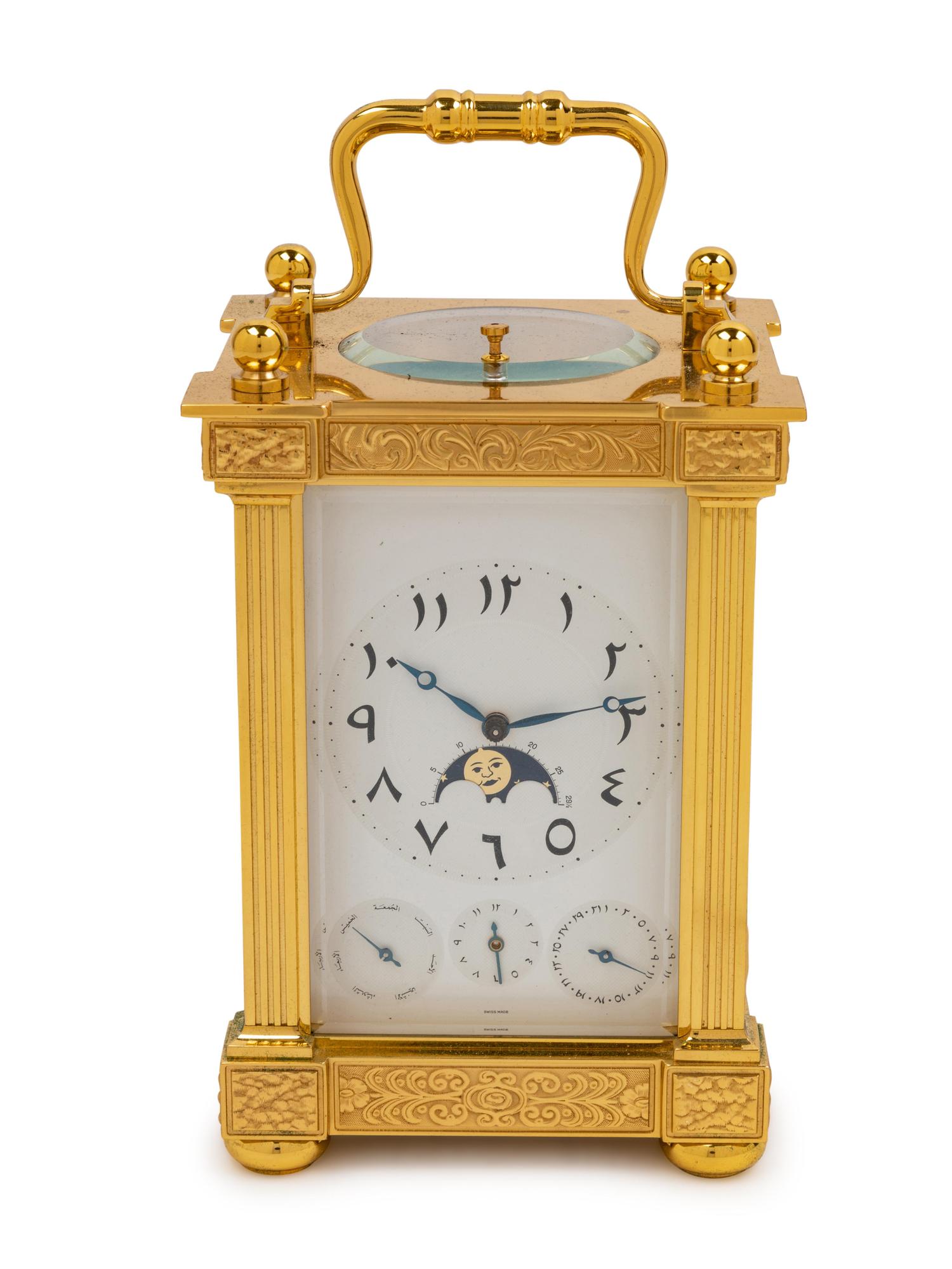 A Swiss Gilt Brass Carriage Clock