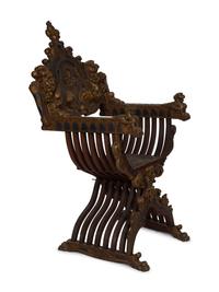 An Italian Painted and Parcel Gilt Savonarola Armchair