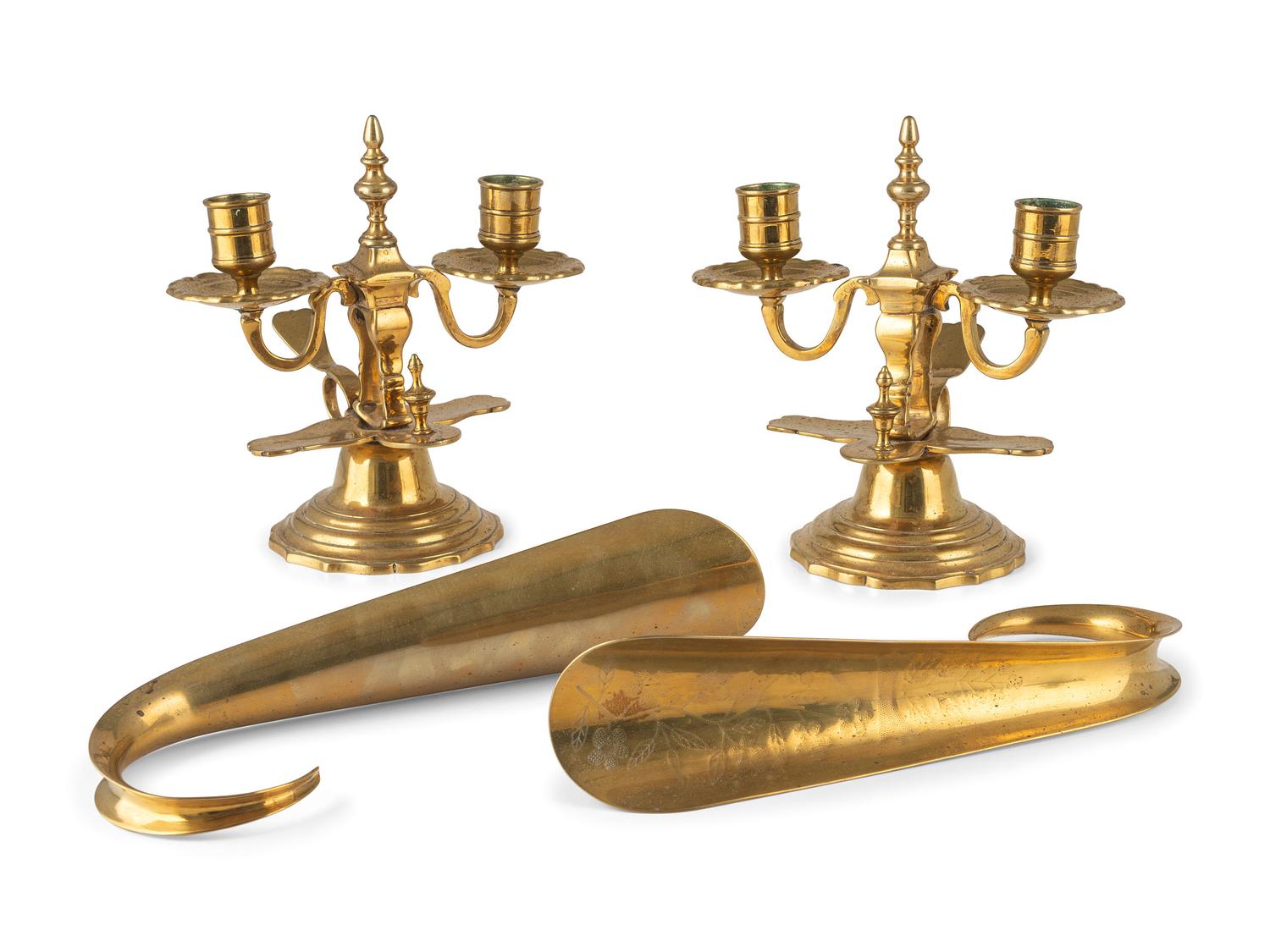 A Pair of Brass Two-Light Candelabra, a Pair of Shoe Horns and Other Brass Articles