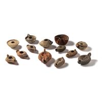 Thirteen Roman and Holy Land Terracotta Lamps