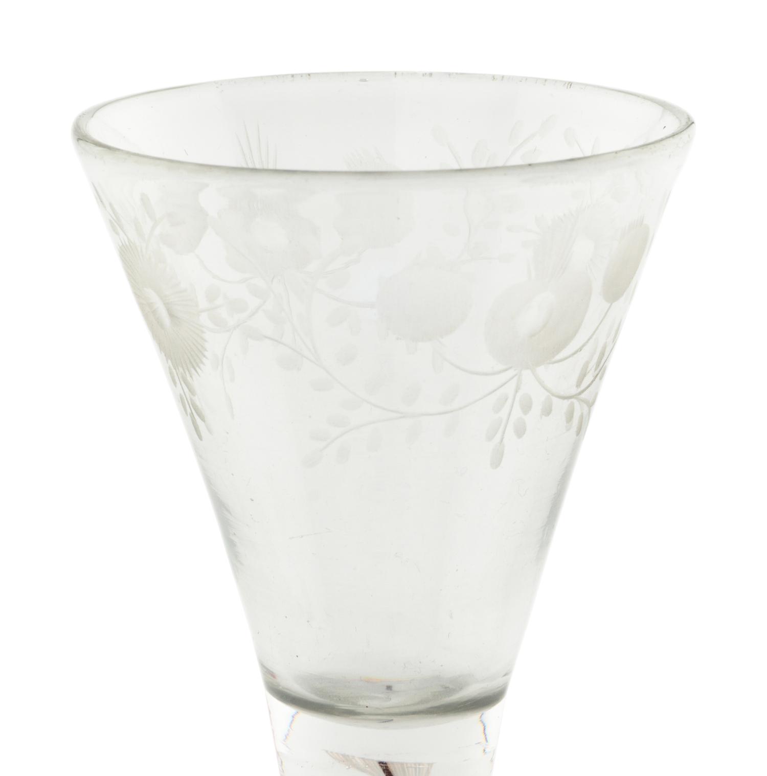 An English Color-Twist and Cut Glass Wine Stem