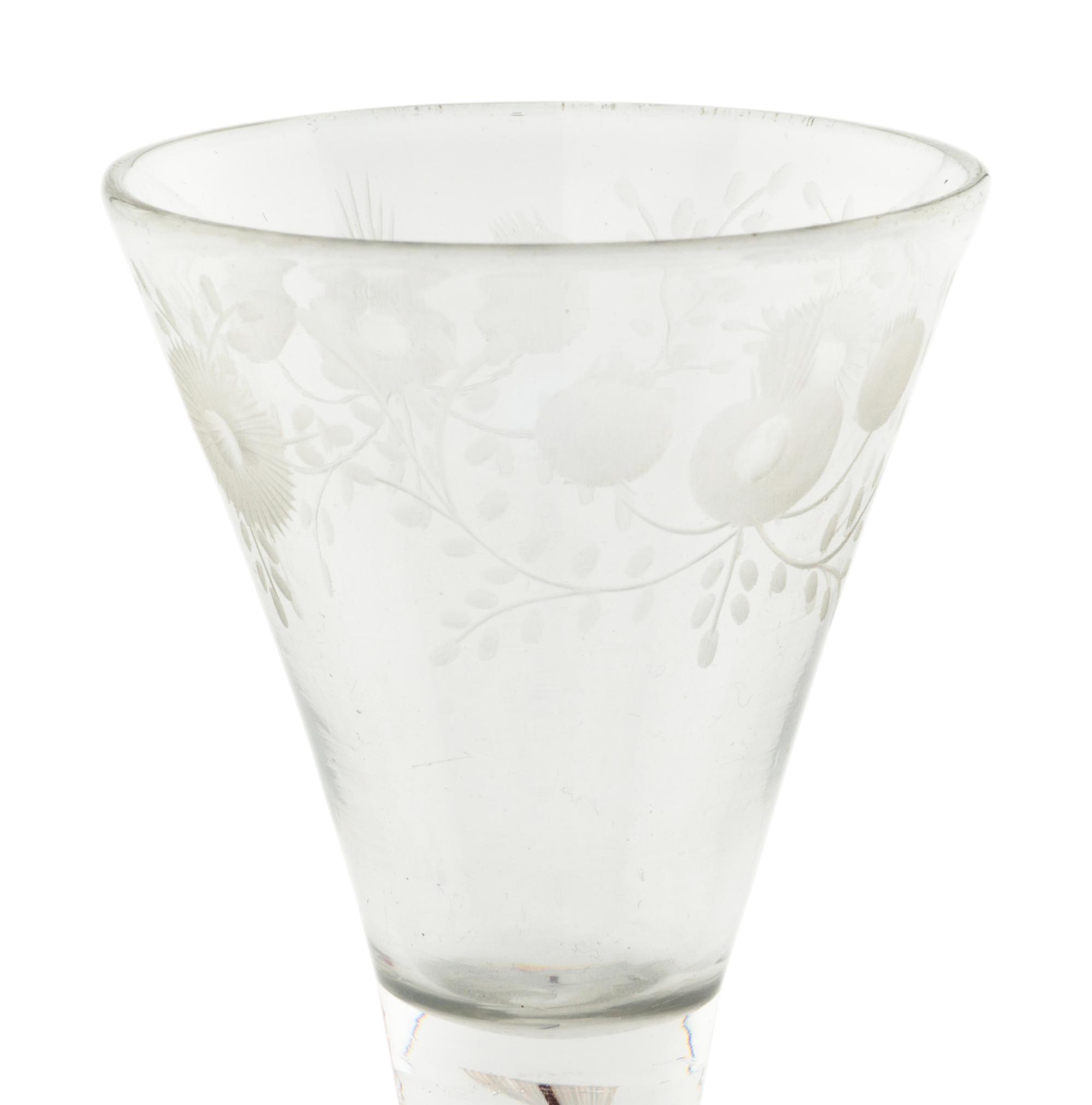 An English Color-Twist and Cut Glass Wine Stem