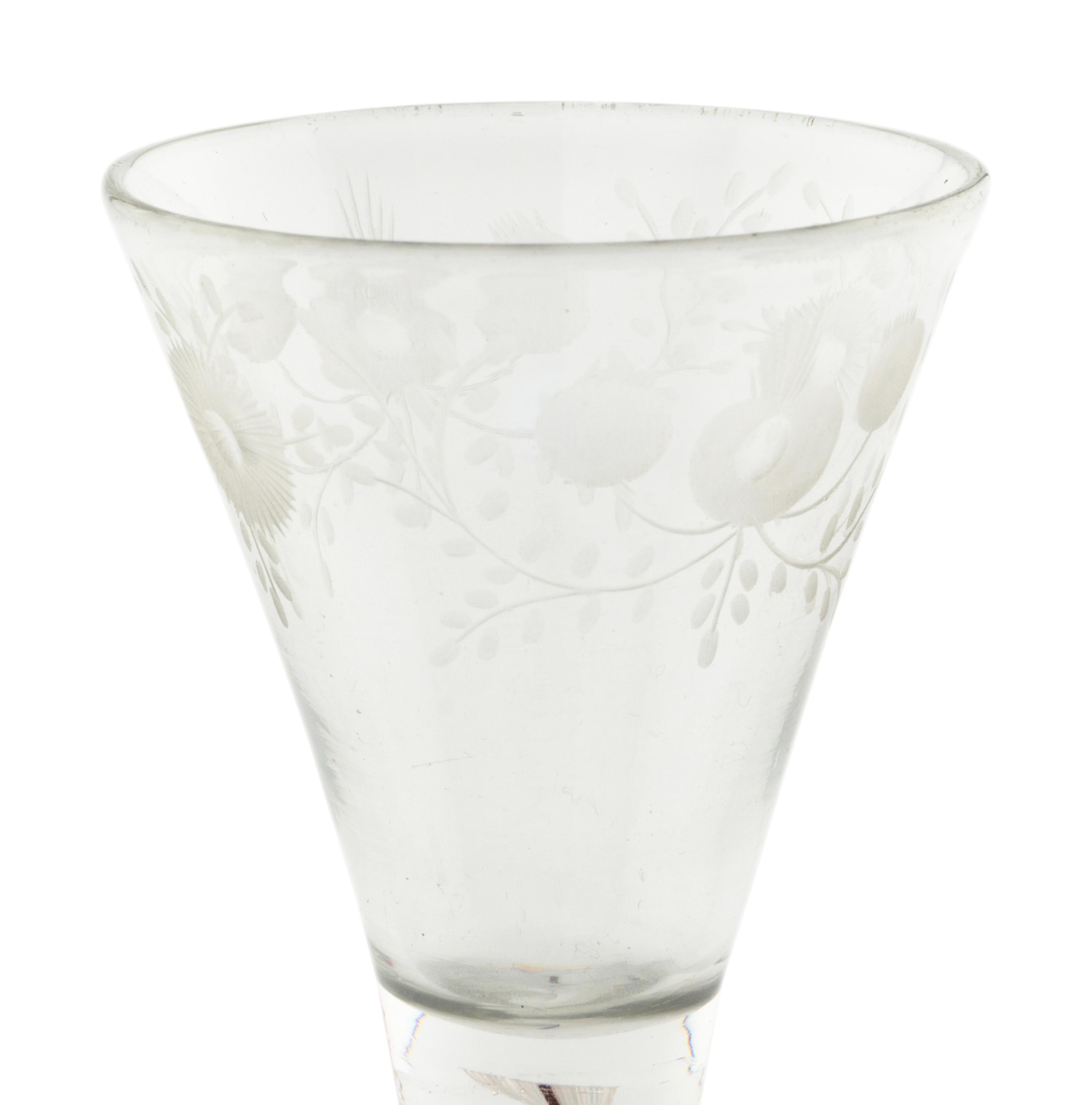 An English Color-Twist and Cut Glass Wine Stem