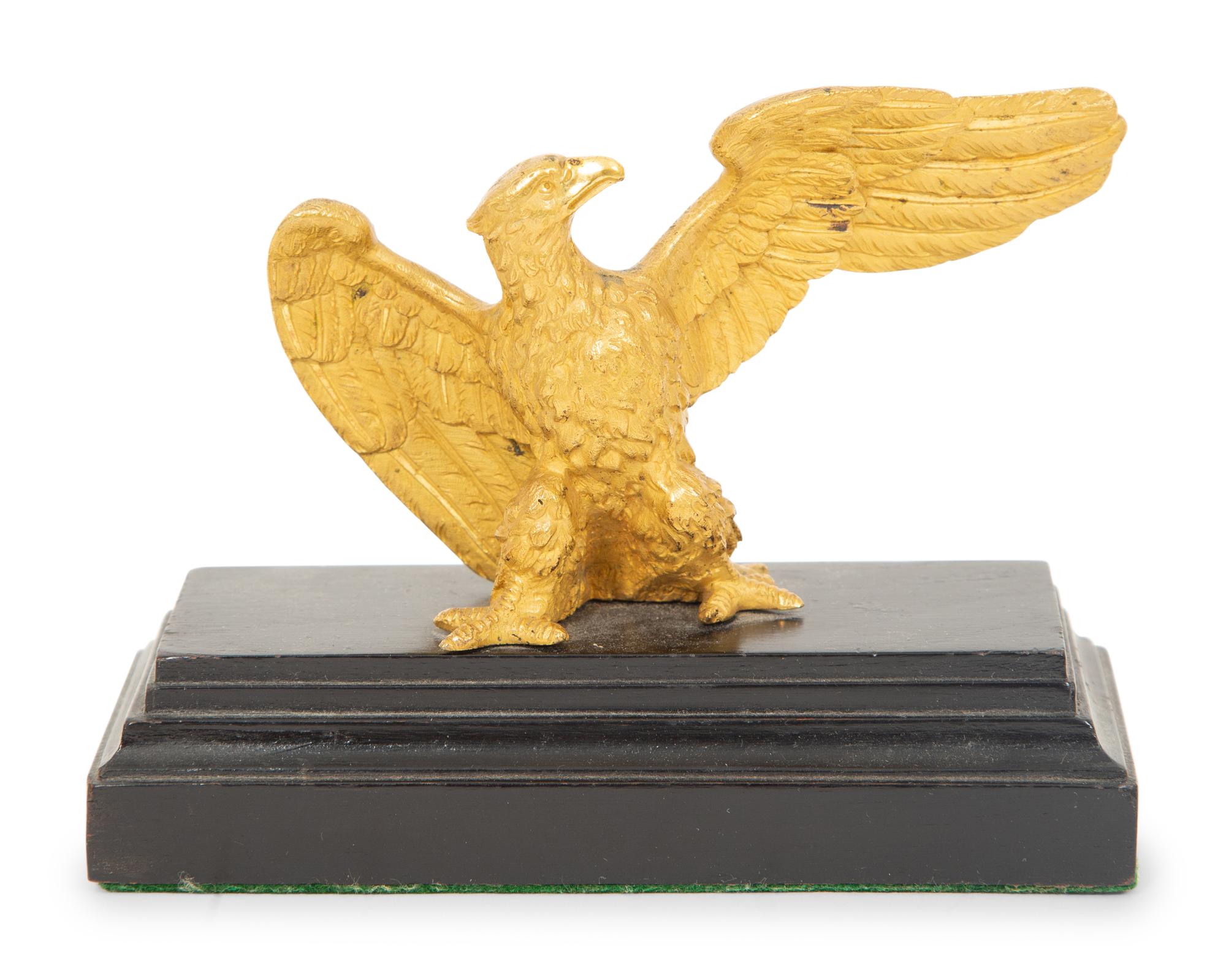 Two Gilt Bronze Eagles