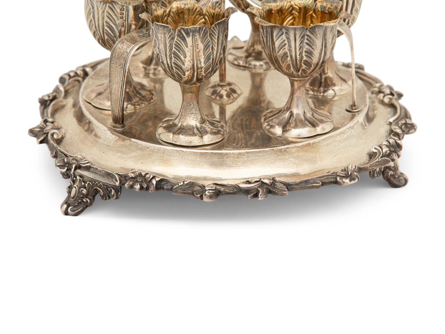 An English Silver Six-Egg Cruet and Footed Silver and Cobalt Glass Basket
