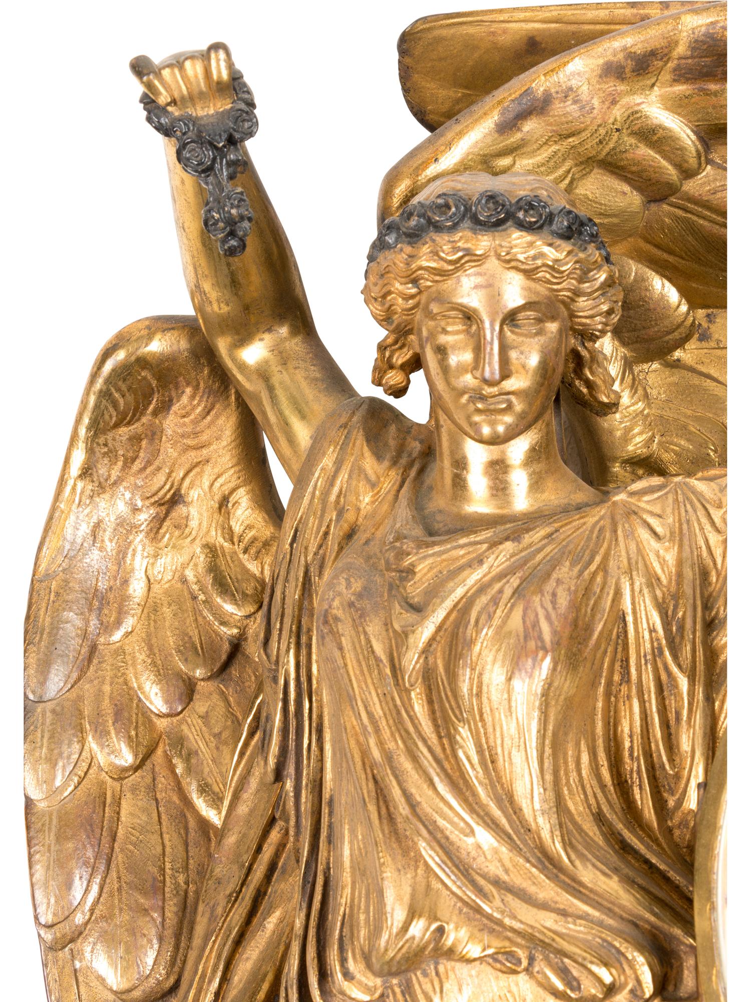 A Neoclassical Gilt Bronze Wall Clock by Louis Valentin Elias Robert (French, 1821-1874)