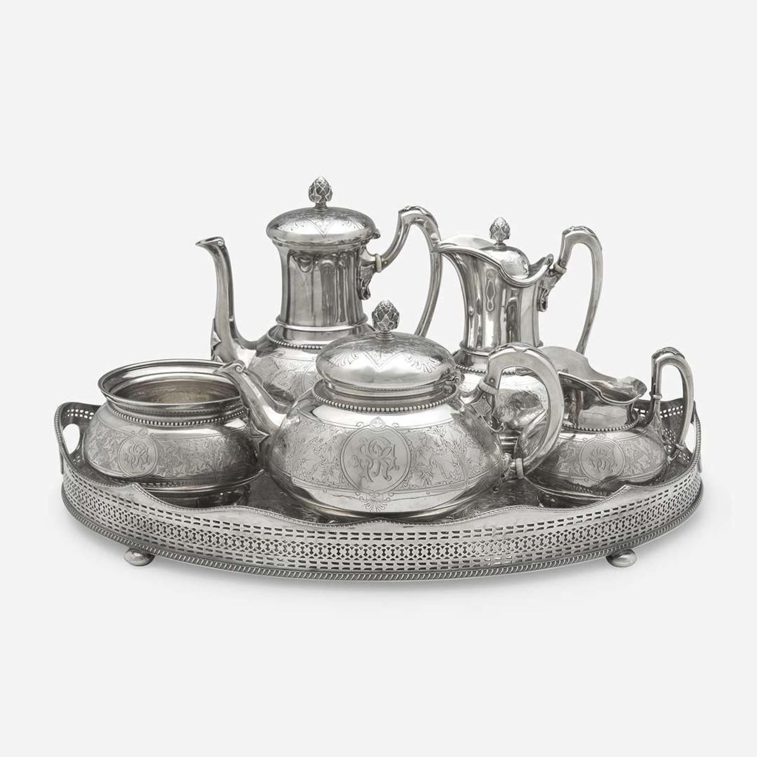 A five-piece sterling silver tea and coffee service in the "Ivy" pattern John Chandler Moore (c. 1803-1874) for Tiffany & Co., New York, NY, 1854-1870