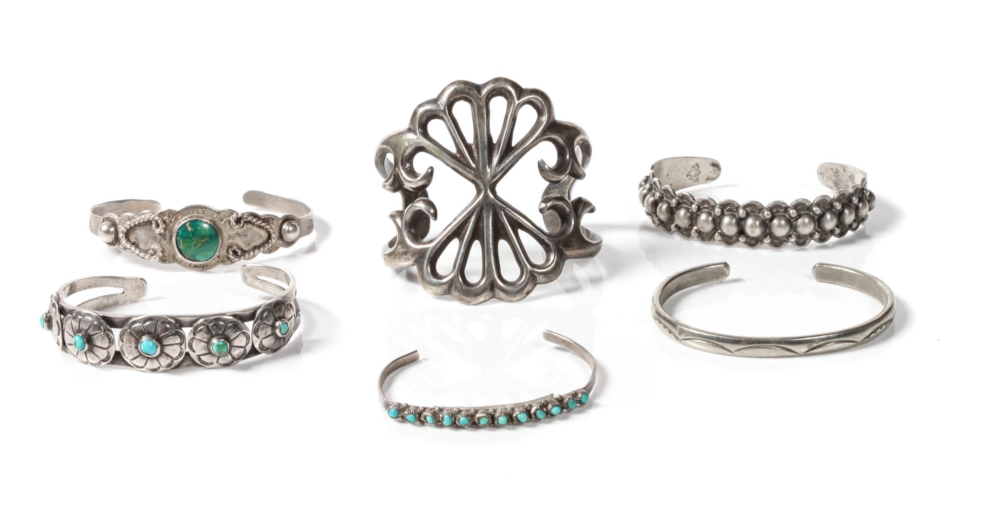 Six Southwestern Silver Bracelets Length of largest 4 5/8 x opening 1 2/8 x width 2 1/4 inches