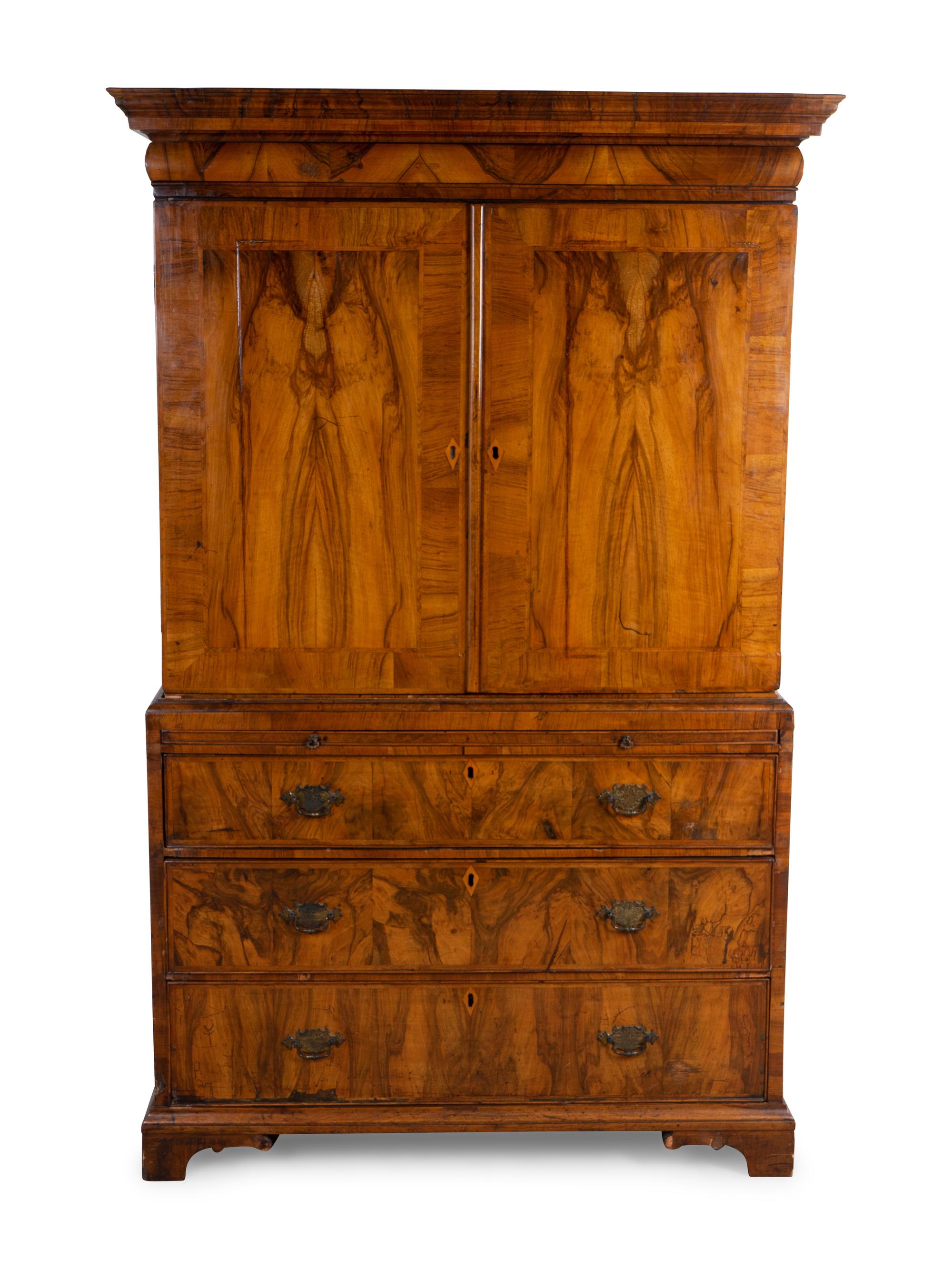 A George III Style Figured Walnut Linen Press — 19TH CENTURY