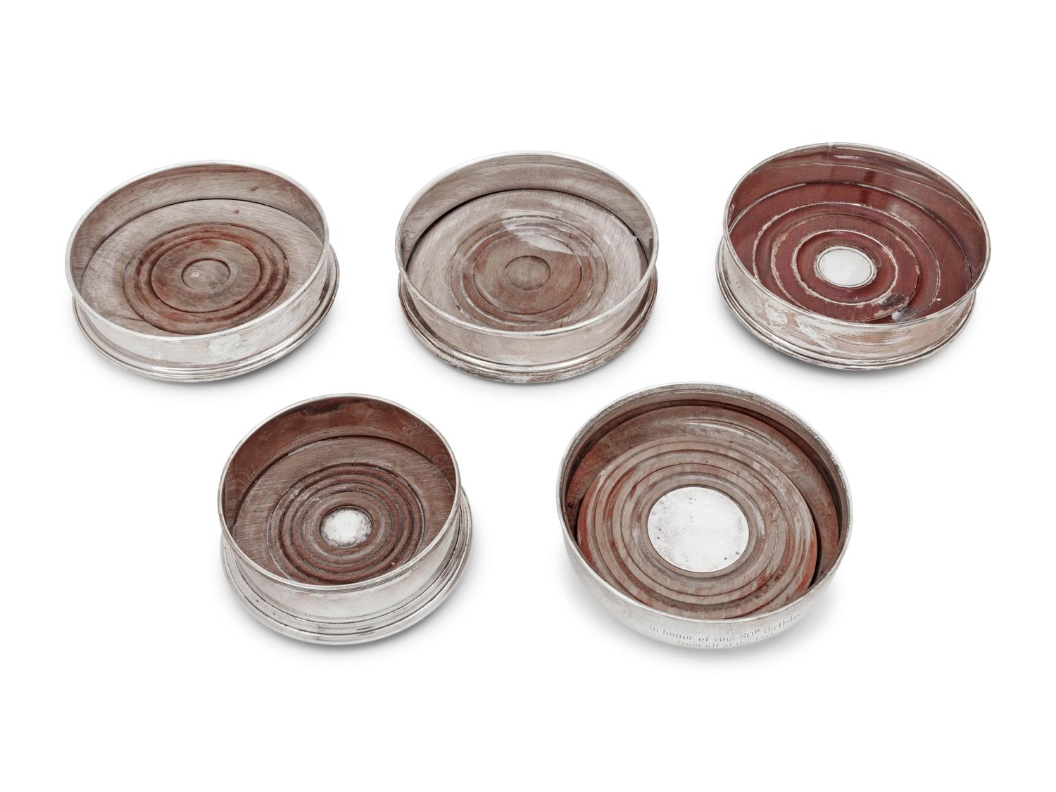 Four Elizabeth II Silver Wine Coasters