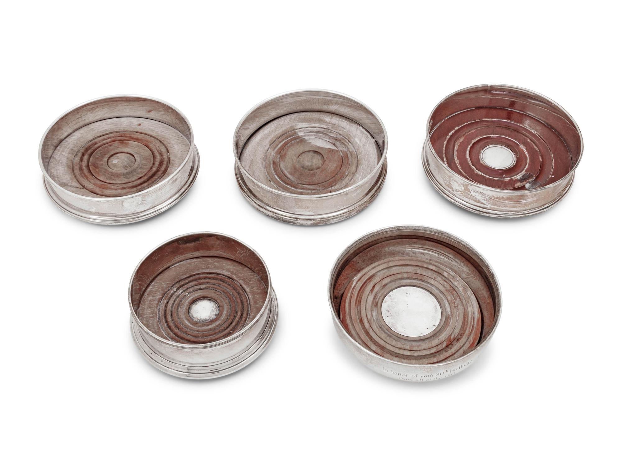 Four Elizabeth II Silver Wine Coasters