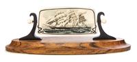 A Scrimshaw Fossil Mammoth Ivory Plaque Width overall 9 1/2 inches. — JULIUS COHEN