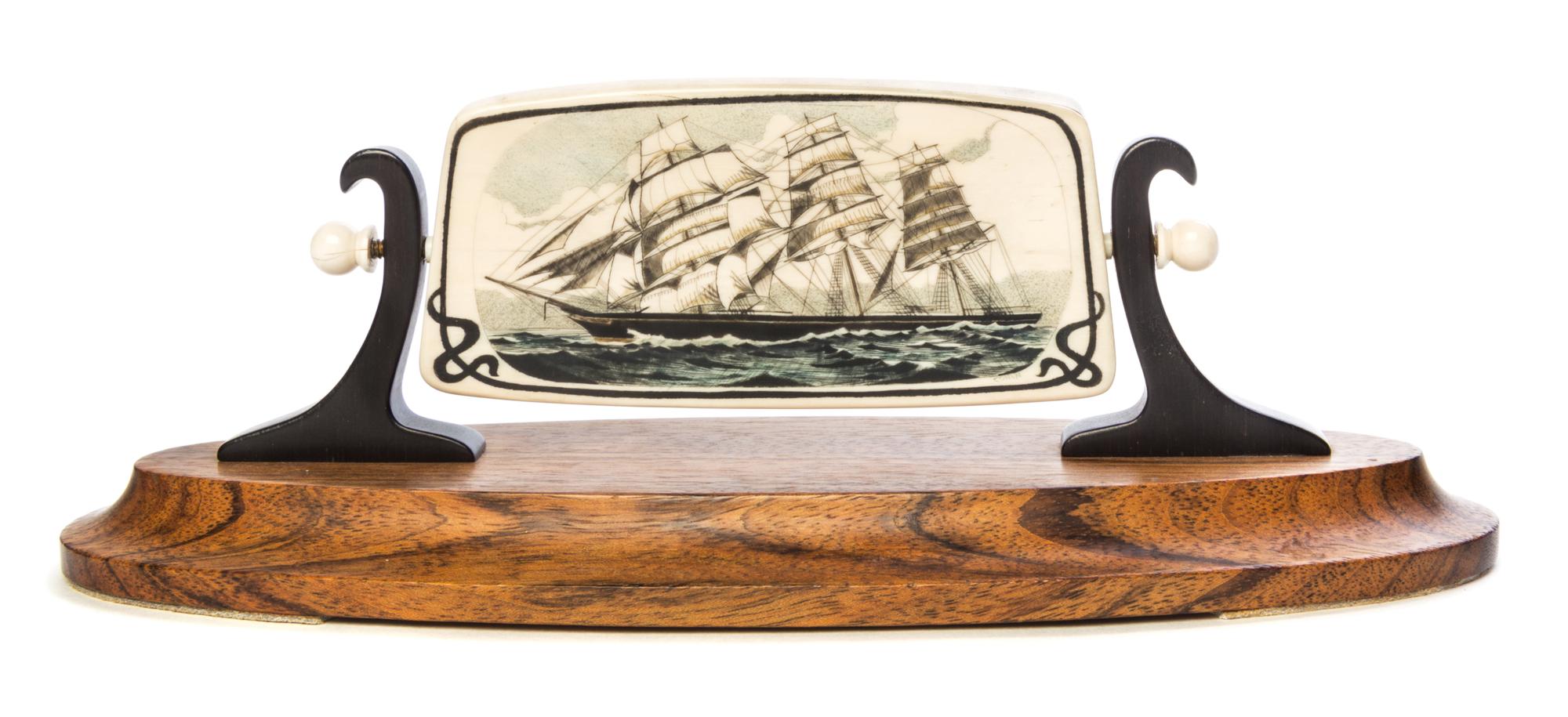 A Scrimshaw Fossil Mammoth Ivory Plaque Width overall 9 1/2 inches. — JULIUS COHEN