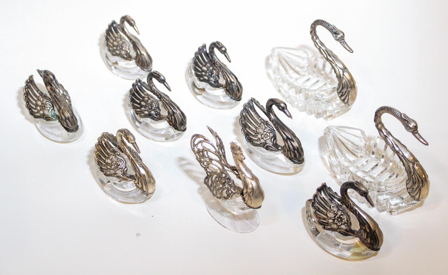 Nine Silver Mounted Glass Swan Form Salts Height of tallest 4 1/4 inches.
